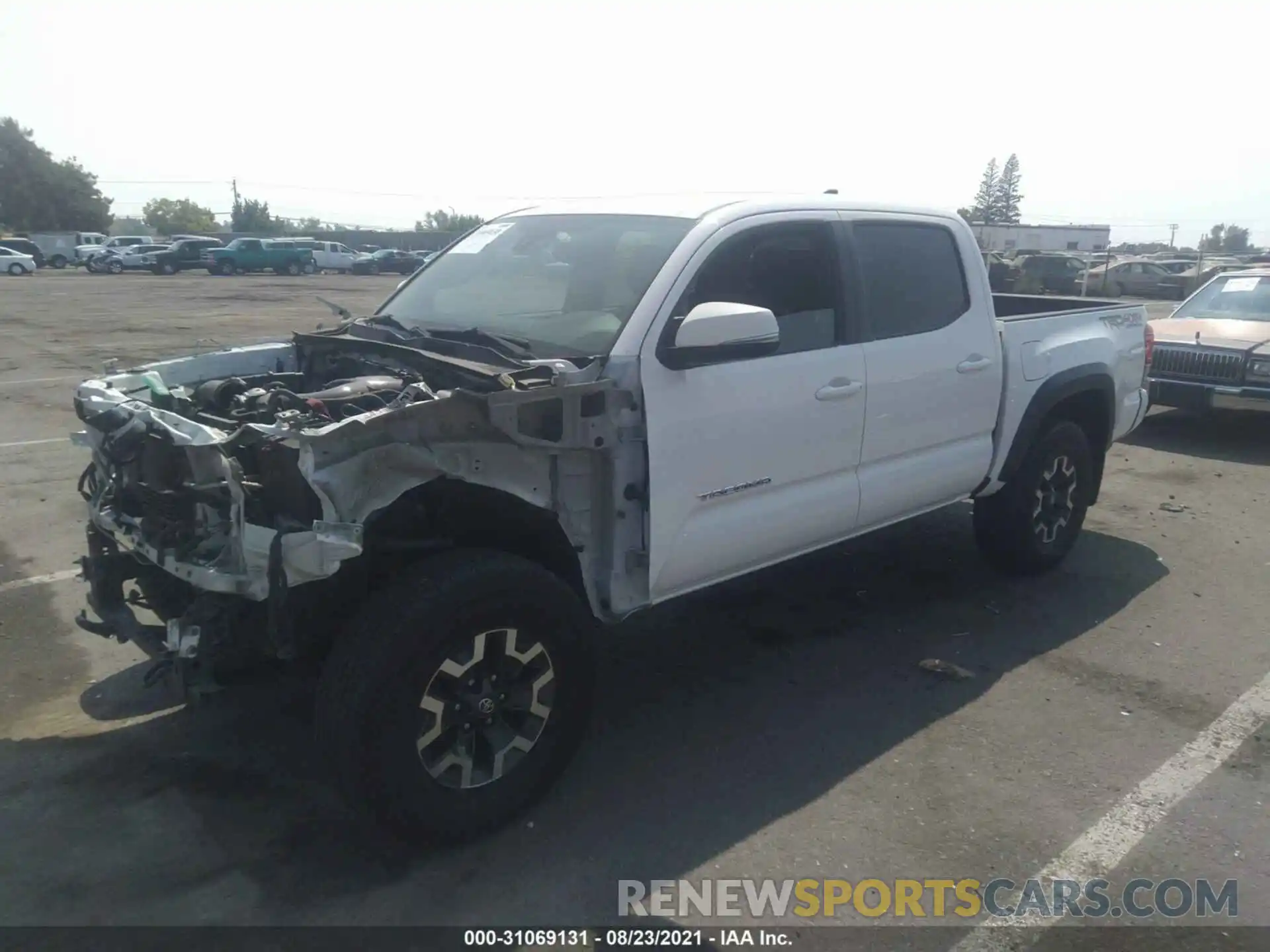 2 Фотография поврежденного автомобиля 3TMCZ5AN2KM249068 TOYOTA TACOMA 4WD 2019