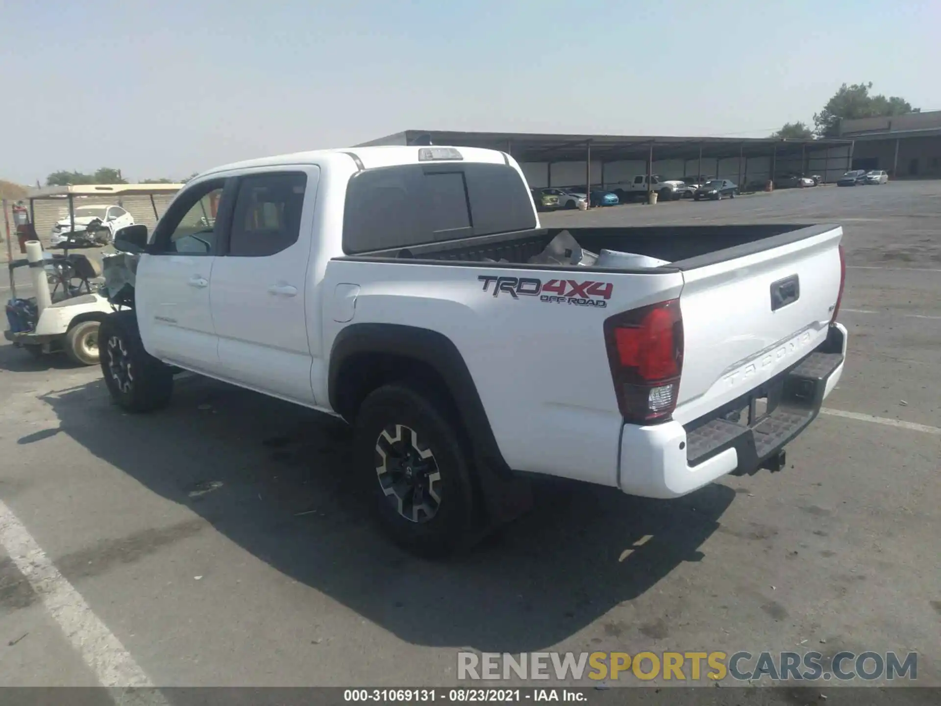 3 Photograph of a damaged car 3TMCZ5AN2KM249068 TOYOTA TACOMA 4WD 2019