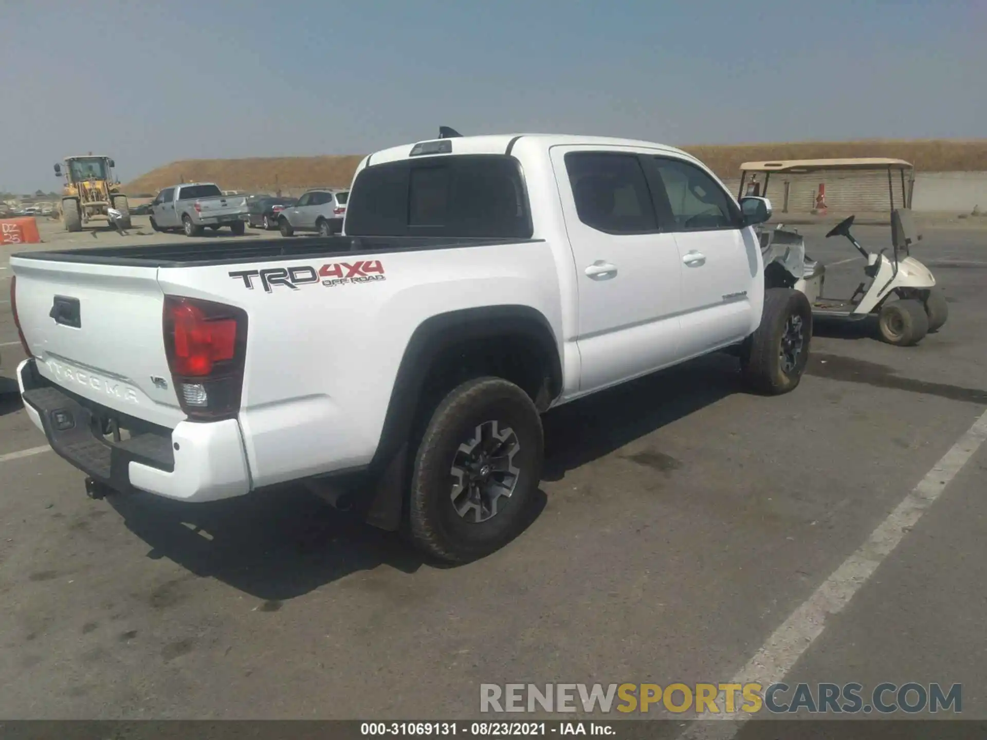 4 Photograph of a damaged car 3TMCZ5AN2KM249068 TOYOTA TACOMA 4WD 2019