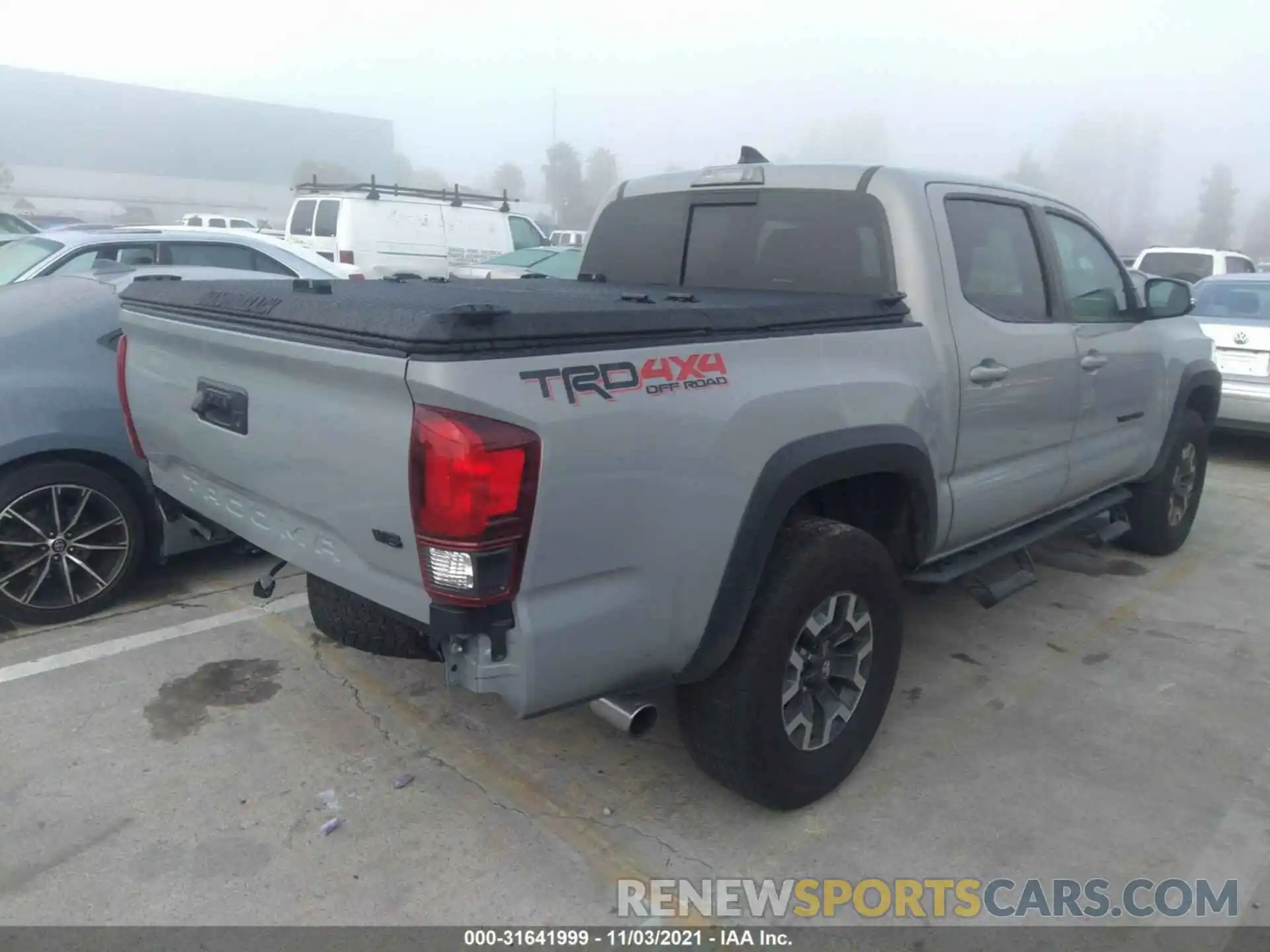 4 Photograph of a damaged car 3TMCZ5AN2KM252567 TOYOTA TACOMA 4WD 2019