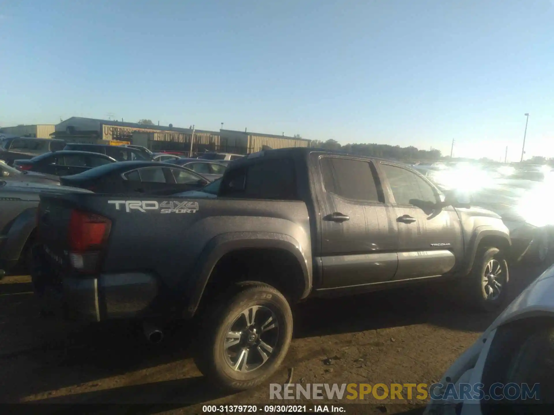 4 Photograph of a damaged car 3TMCZ5AN2KM271779 TOYOTA TACOMA 4WD 2019