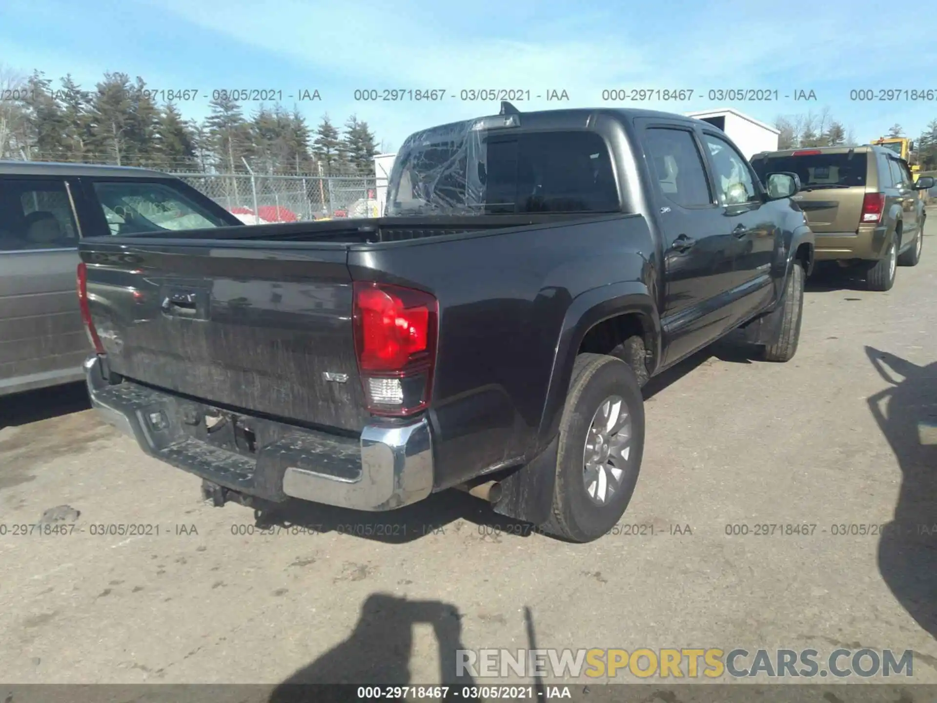 4 Photograph of a damaged car 3TMCZ5AN2KM282068 TOYOTA TACOMA 4WD 2019