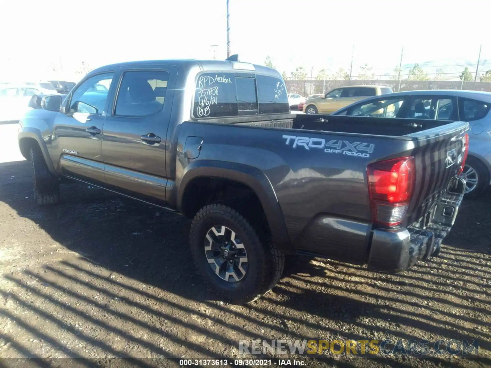 3 Photograph of a damaged car 3TMCZ5AN2KM283348 TOYOTA TACOMA 4WD 2019