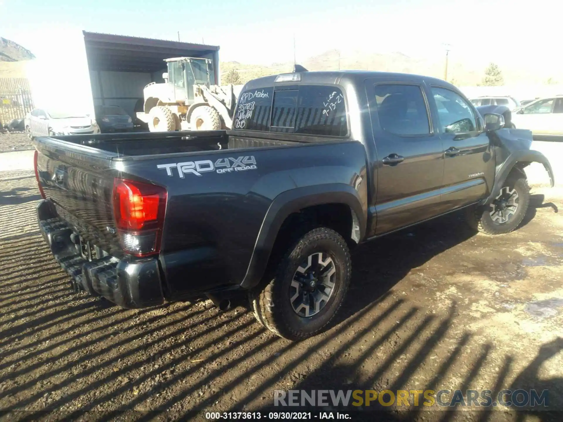 4 Photograph of a damaged car 3TMCZ5AN2KM283348 TOYOTA TACOMA 4WD 2019