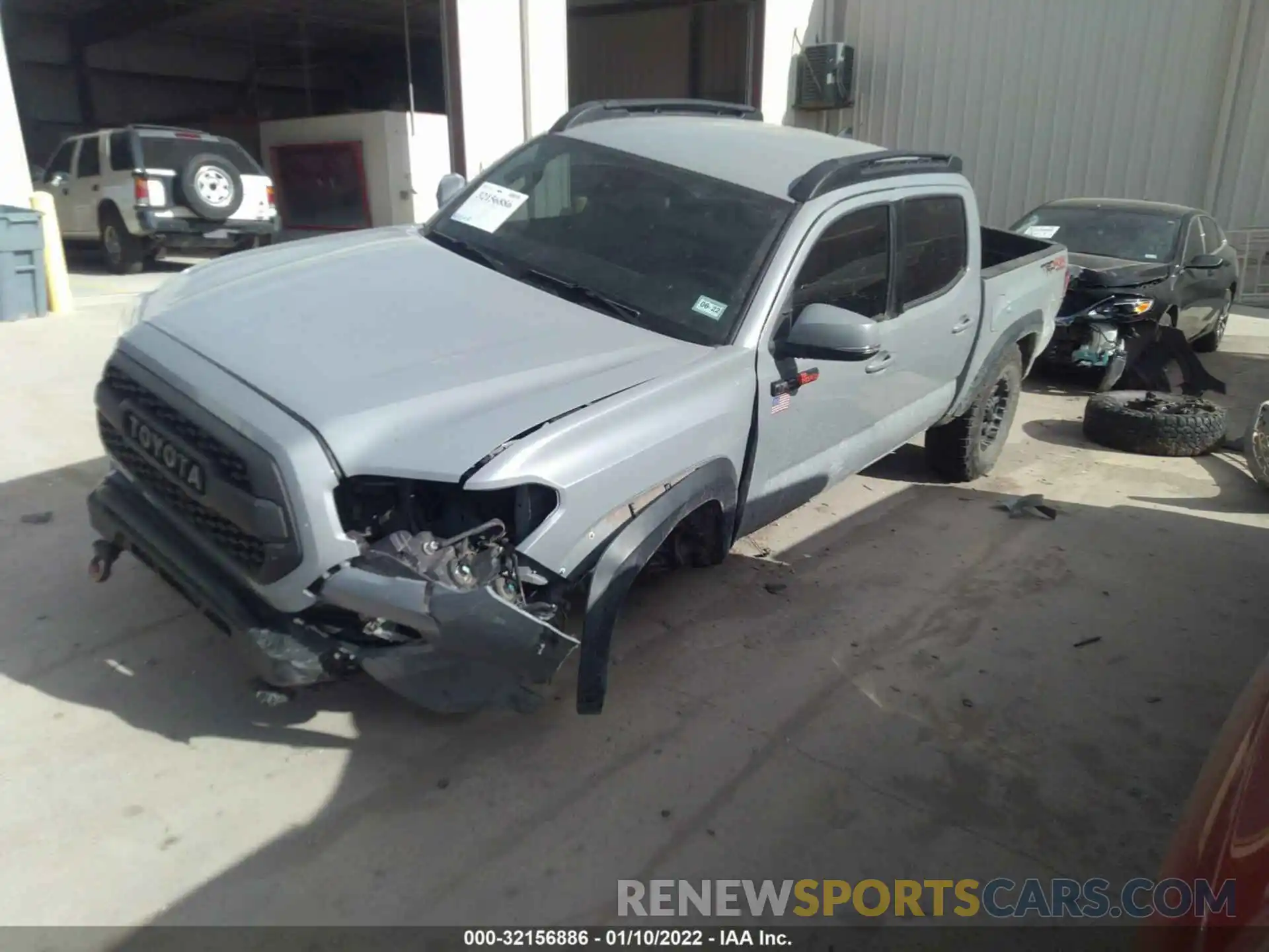 2 Photograph of a damaged car 3TMCZ5AN3KM209212 TOYOTA TACOMA 4WD 2019