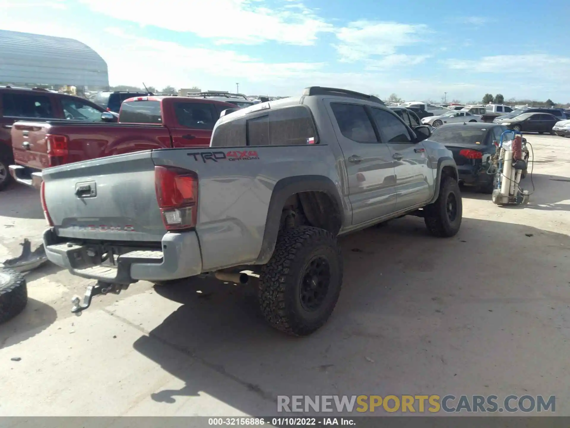 4 Photograph of a damaged car 3TMCZ5AN3KM209212 TOYOTA TACOMA 4WD 2019