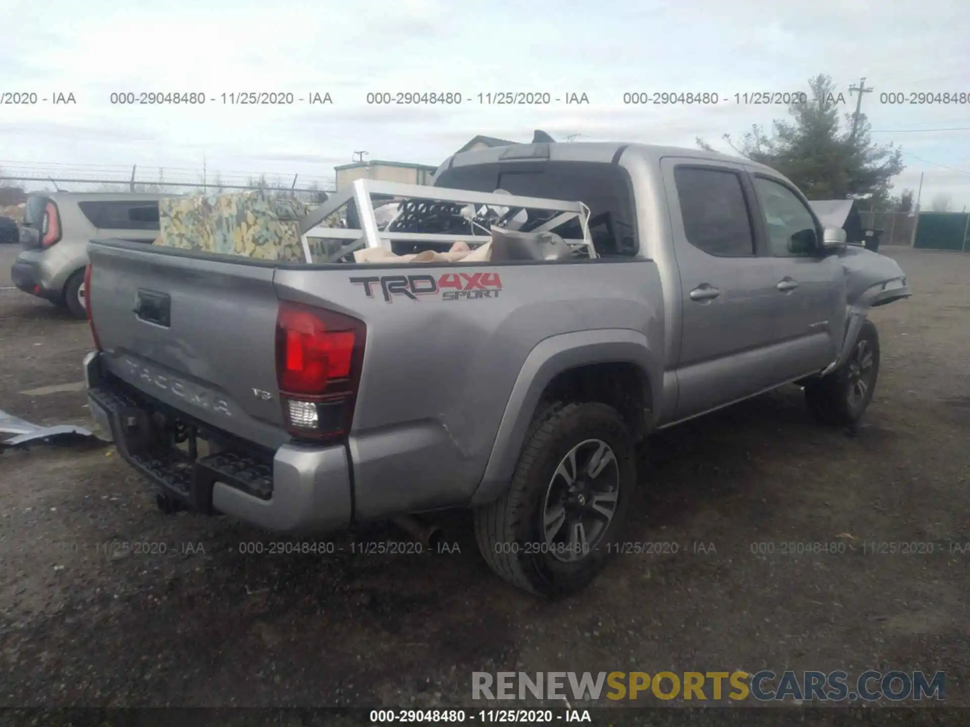 4 Photograph of a damaged car 3TMCZ5AN3KM214393 TOYOTA TACOMA 4WD 2019