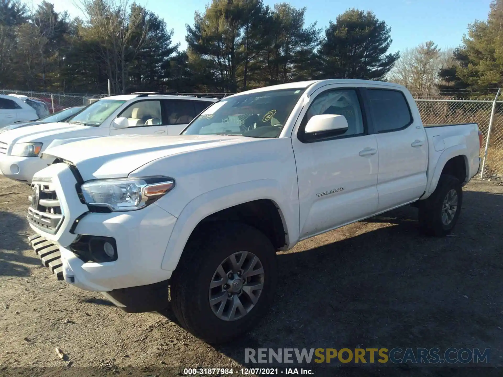 2 Photograph of a damaged car 3TMCZ5AN3KM222512 TOYOTA TACOMA 4WD 2019