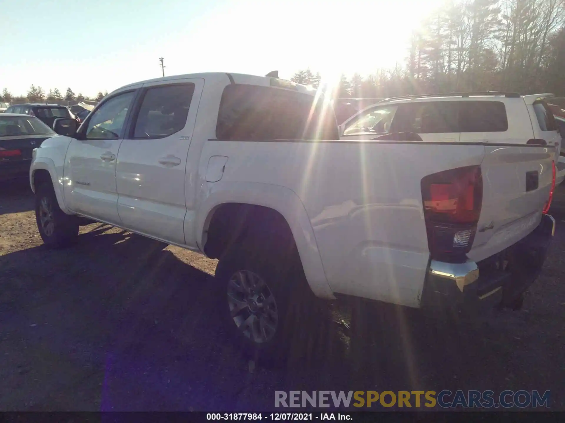 3 Photograph of a damaged car 3TMCZ5AN3KM222512 TOYOTA TACOMA 4WD 2019