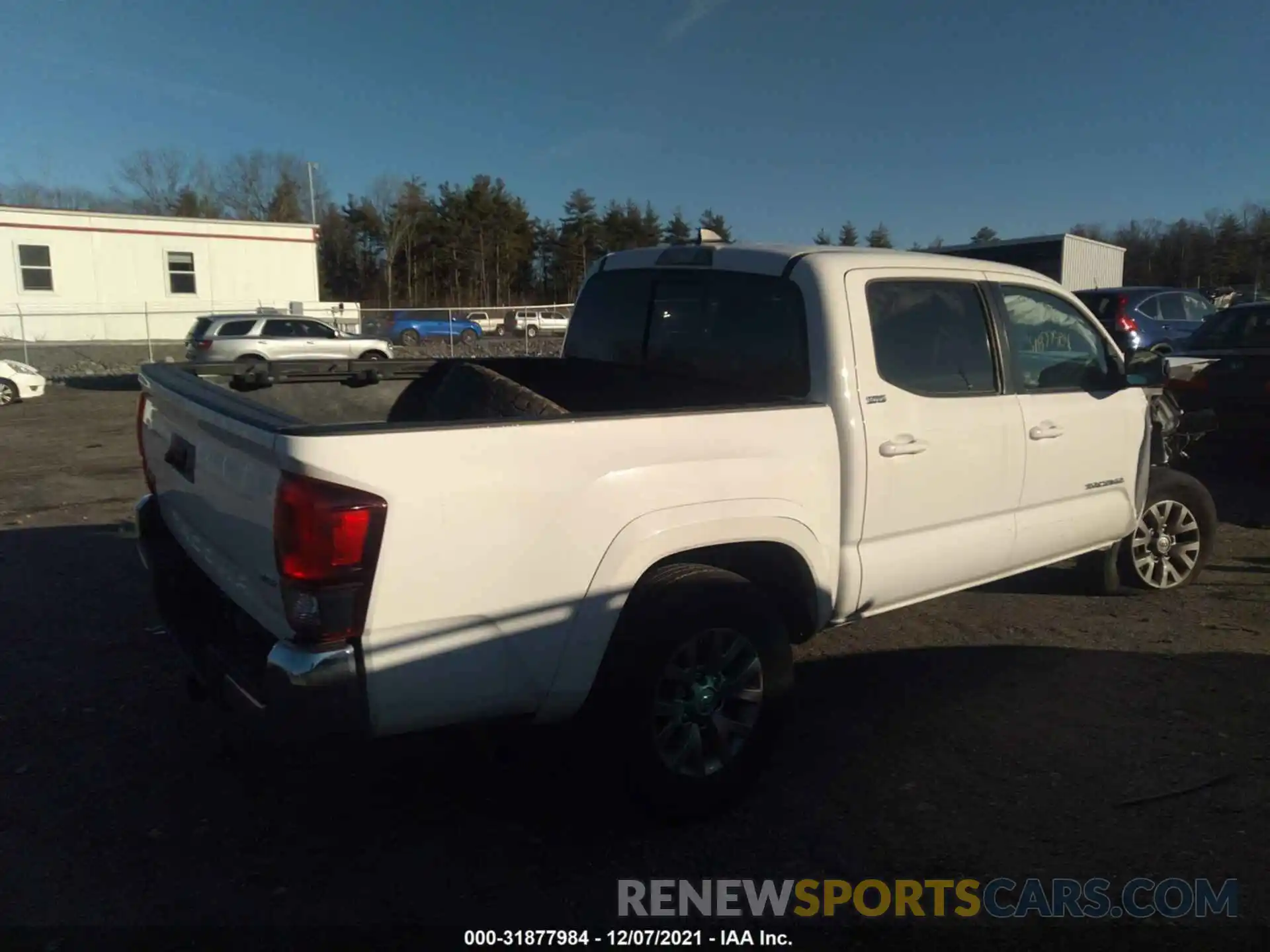 4 Photograph of a damaged car 3TMCZ5AN3KM222512 TOYOTA TACOMA 4WD 2019