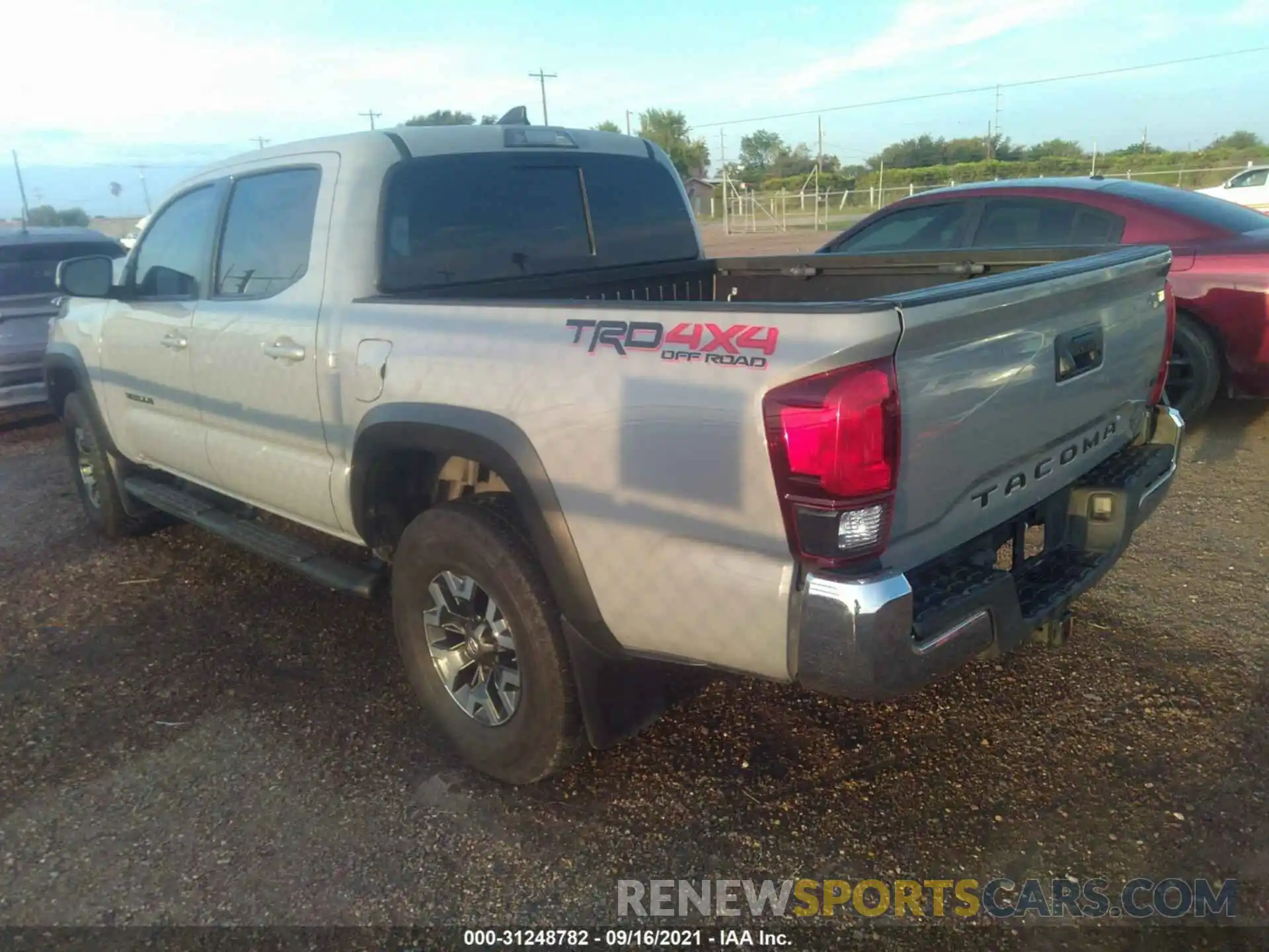 3 Photograph of a damaged car 3TMCZ5AN3KM230724 TOYOTA TACOMA 4WD 2019