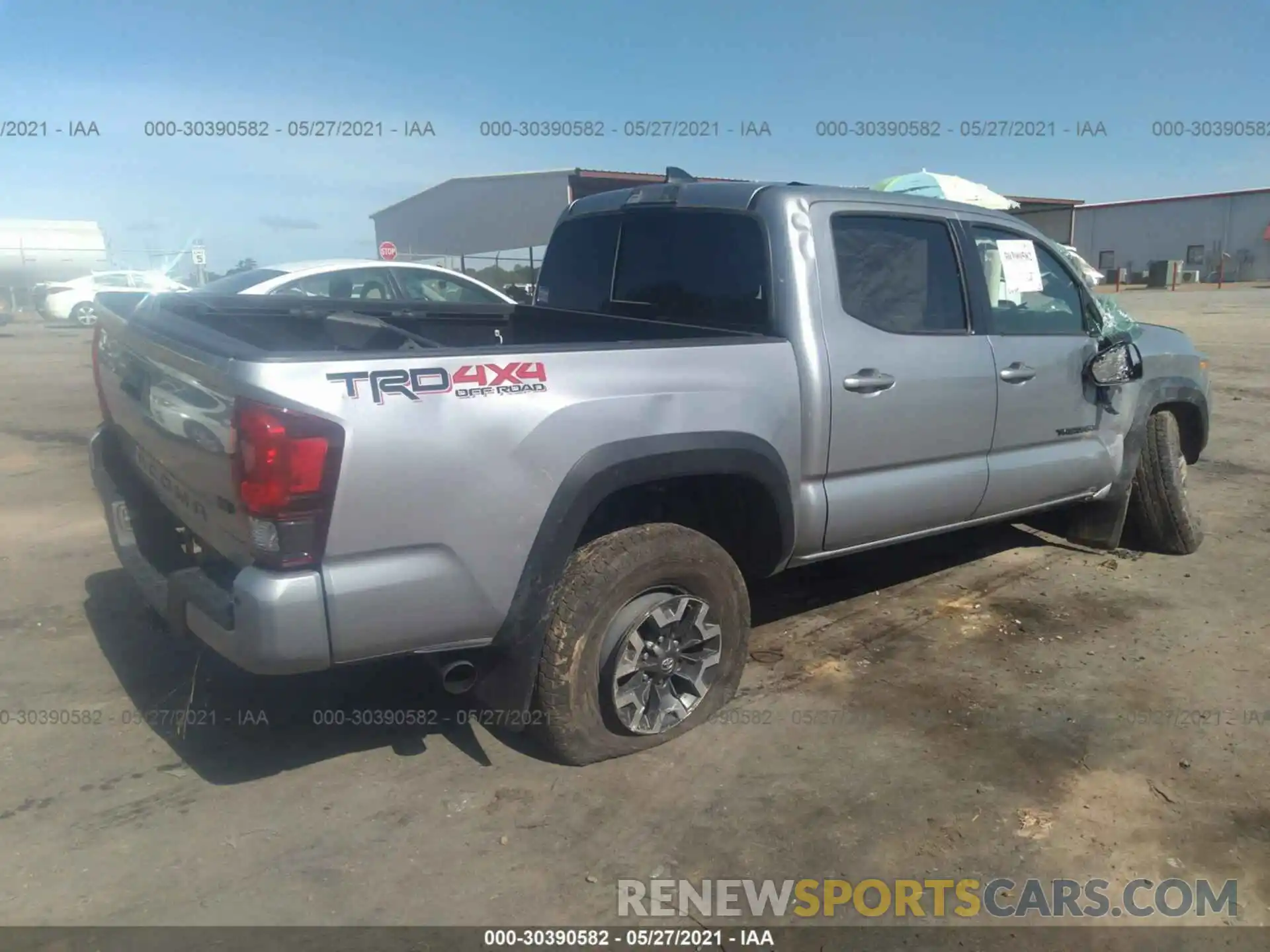 4 Photograph of a damaged car 3TMCZ5AN3KM236765 TOYOTA TACOMA 4WD 2019