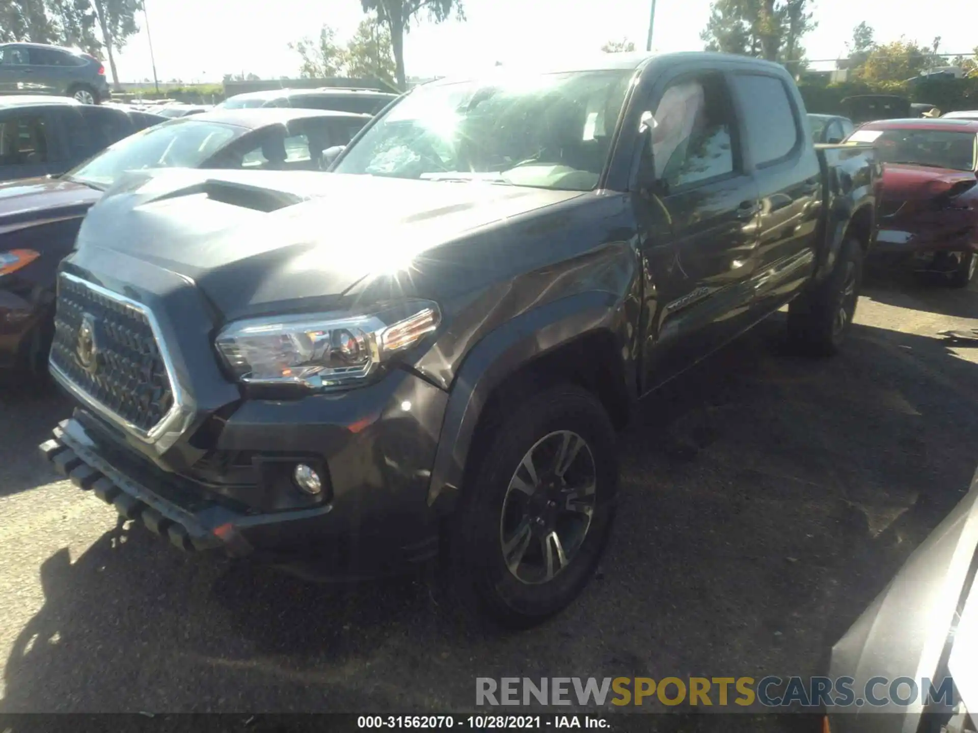 2 Photograph of a damaged car 3TMCZ5AN3KM236894 TOYOTA TACOMA 4WD 2019