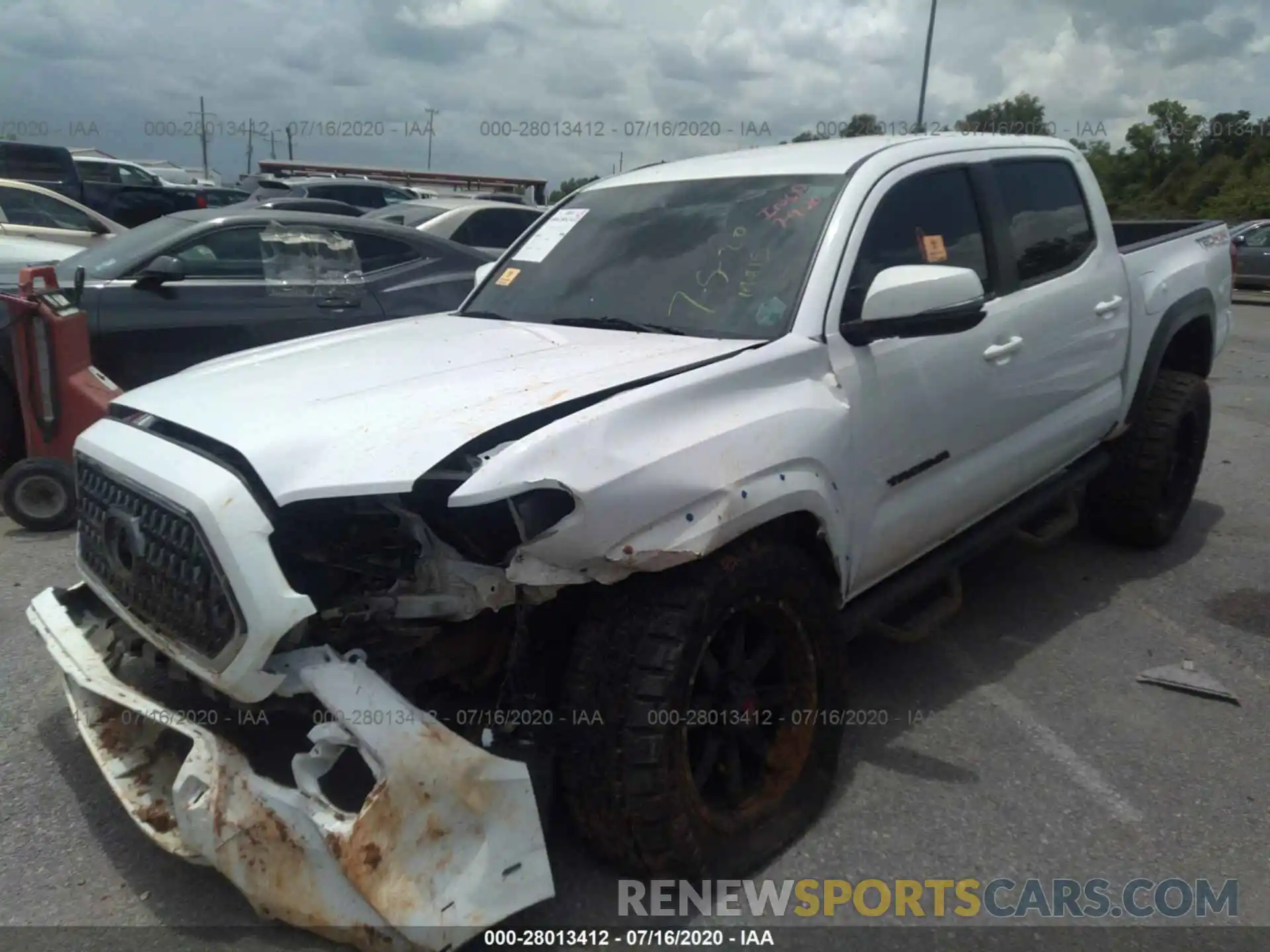 2 Photograph of a damaged car 3TMCZ5AN3KM242064 TOYOTA TACOMA 4WD 2019