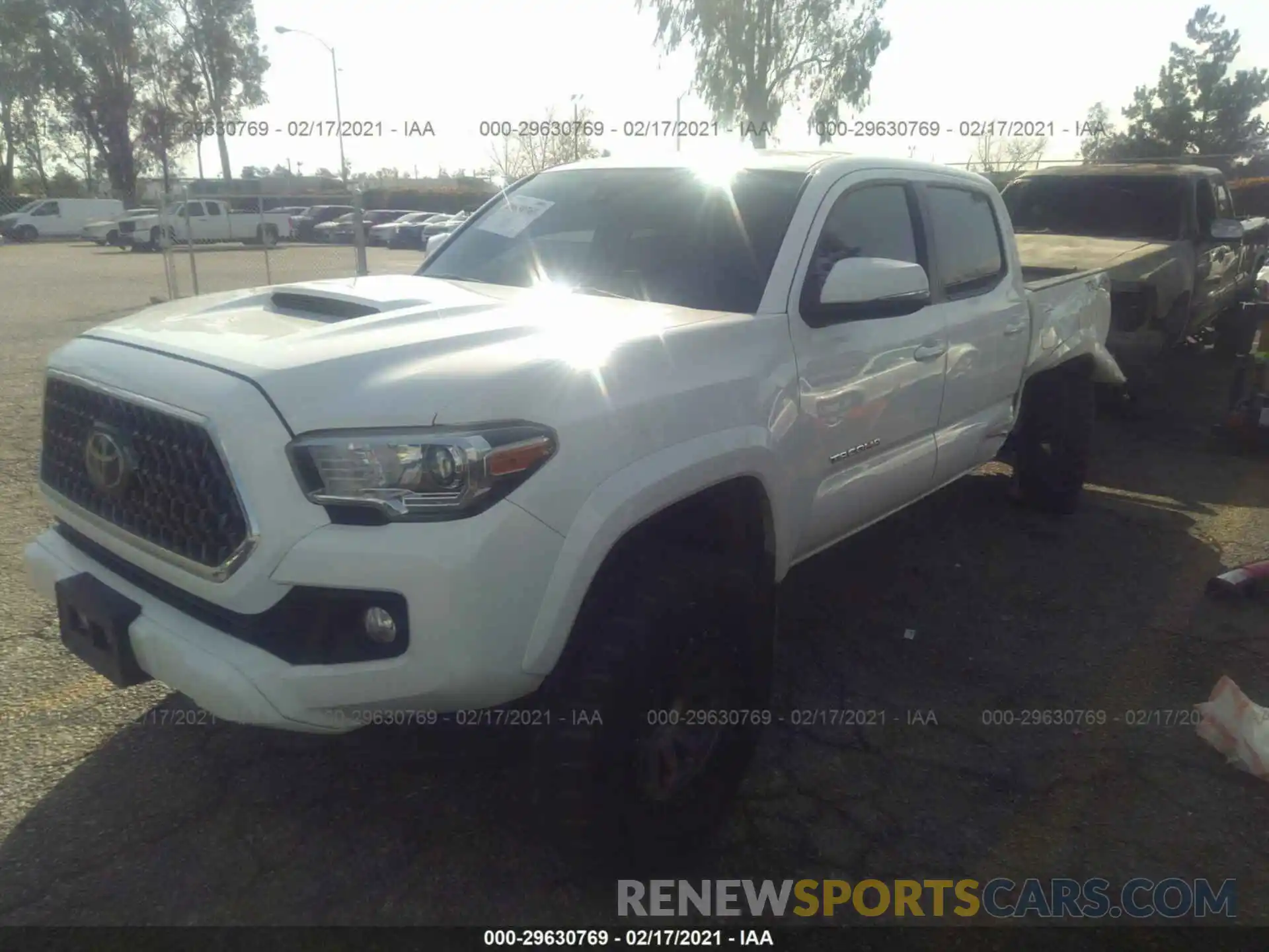 2 Photograph of a damaged car 3TMCZ5AN3KM258250 TOYOTA TACOMA 4WD 2019