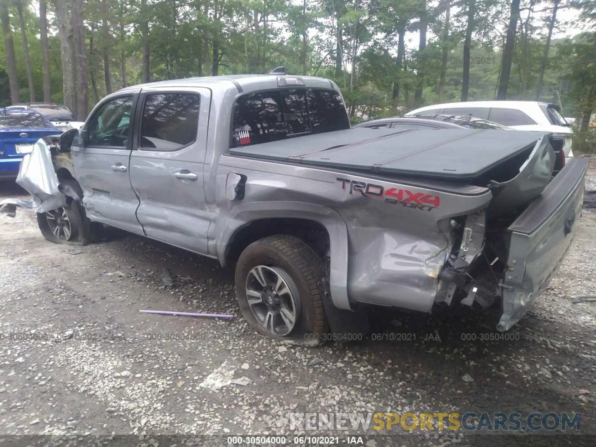 3 Photograph of a damaged car 3TMCZ5AN3KM262959 TOYOTA TACOMA 4WD 2019