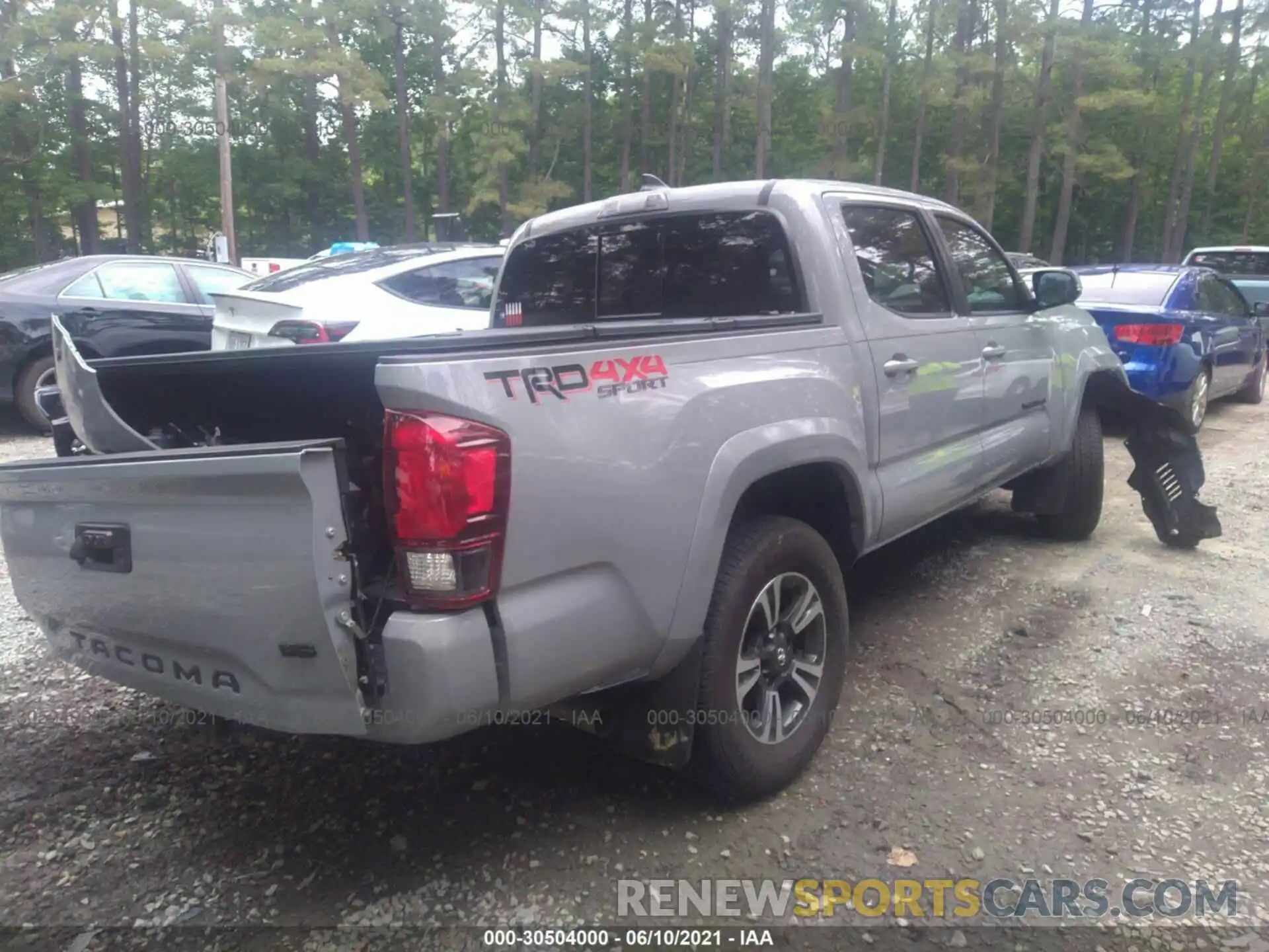 4 Photograph of a damaged car 3TMCZ5AN3KM262959 TOYOTA TACOMA 4WD 2019