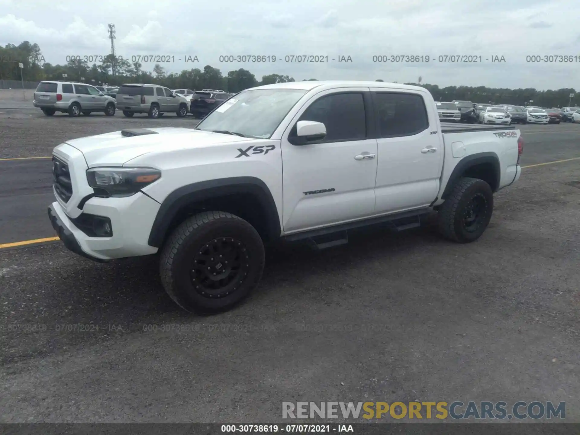 2 Photograph of a damaged car 3TMCZ5AN3KM271113 TOYOTA TACOMA 4WD 2019