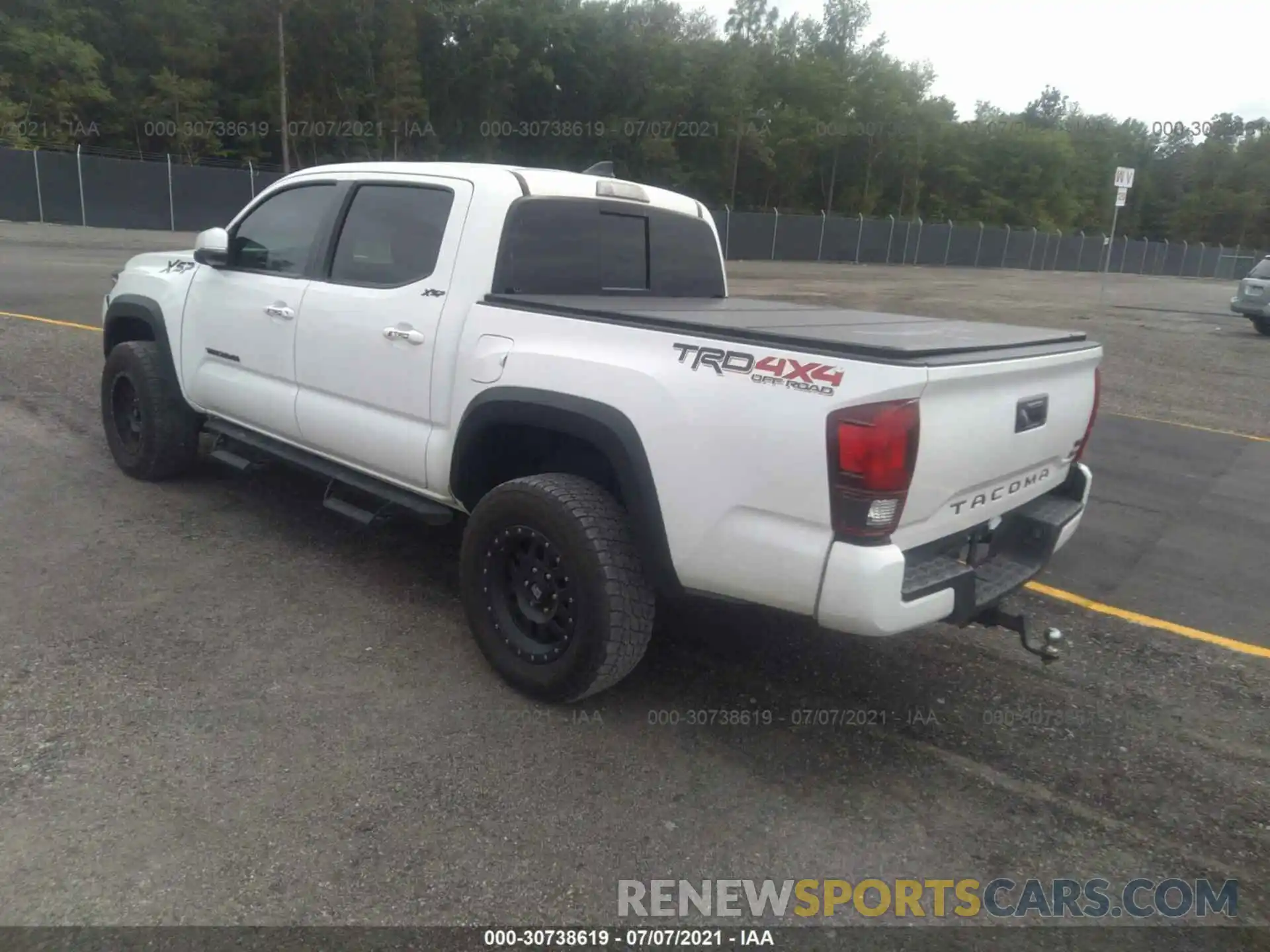 3 Photograph of a damaged car 3TMCZ5AN3KM271113 TOYOTA TACOMA 4WD 2019