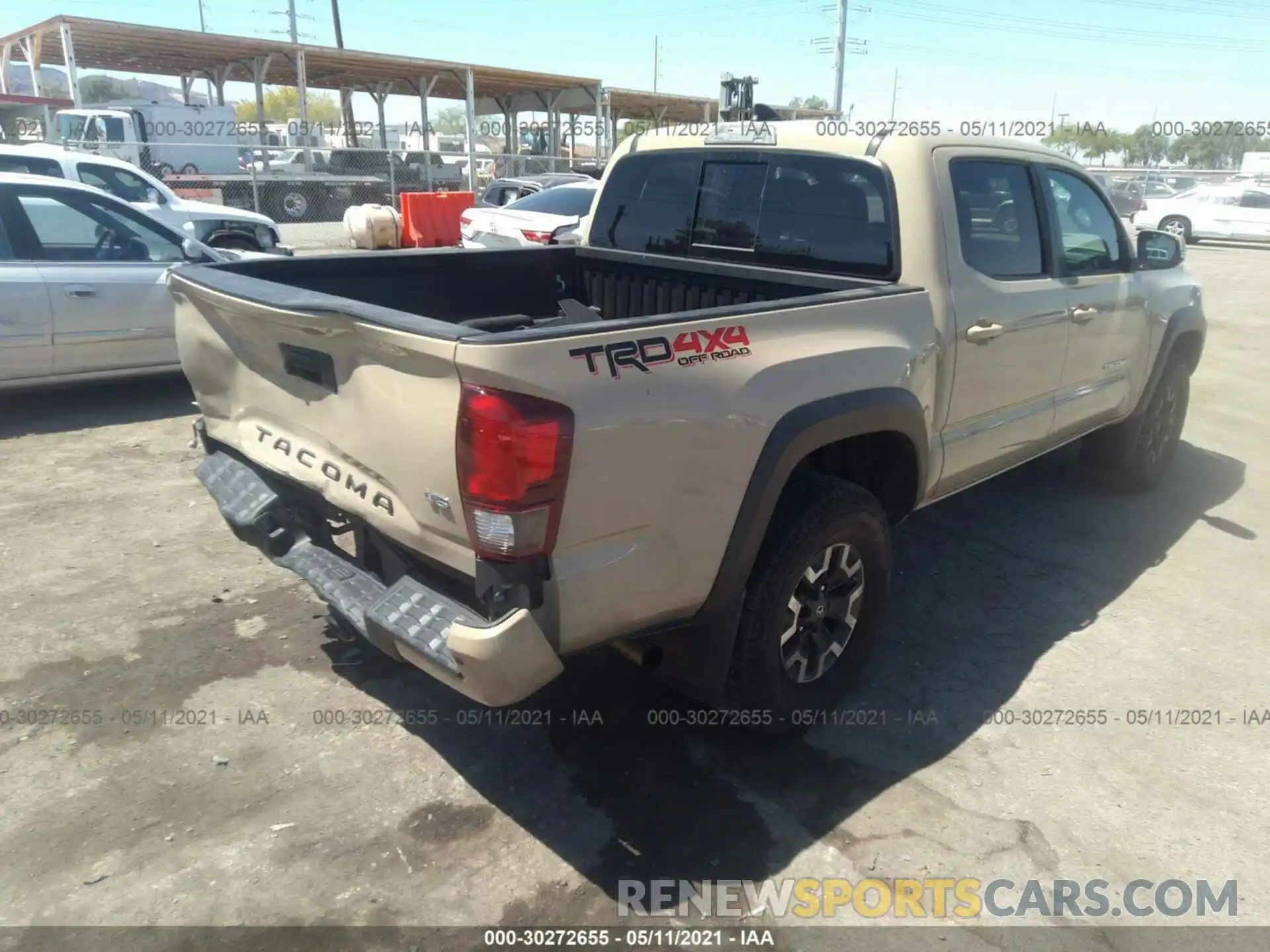 4 Photograph of a damaged car 3TMCZ5AN3KM274500 TOYOTA TACOMA 4WD 2019