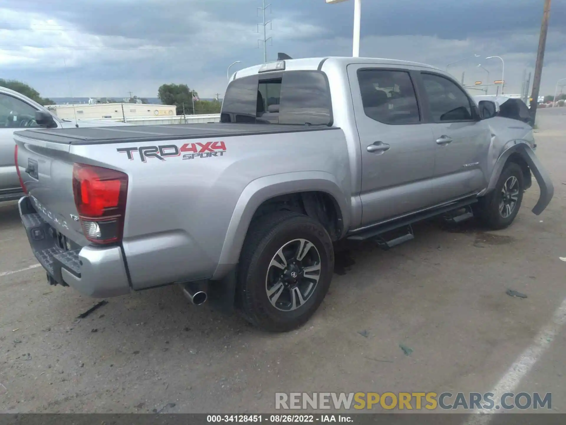 4 Photograph of a damaged car 3TMCZ5AN3KM274643 TOYOTA TACOMA 4WD 2019