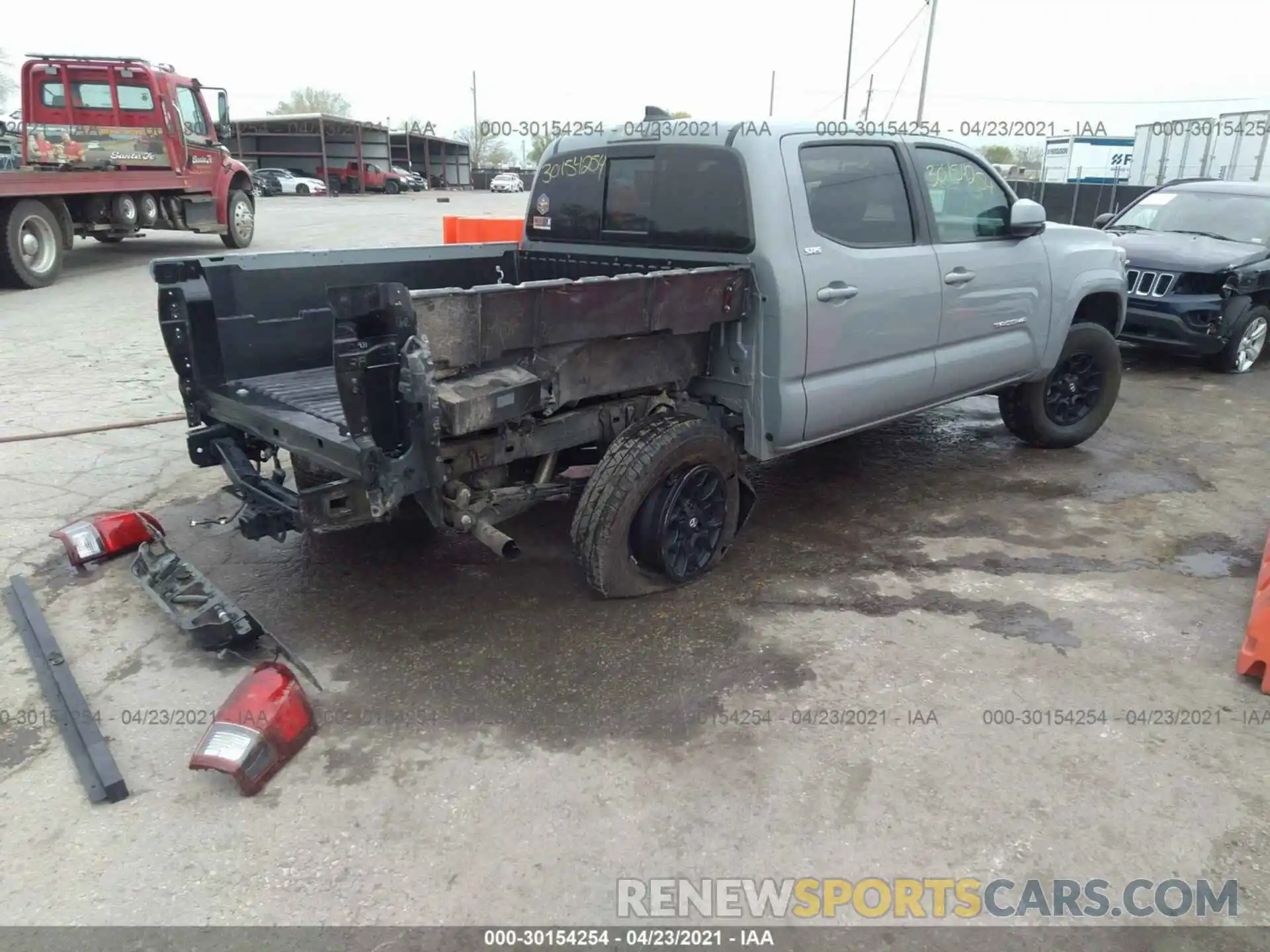 4 Photograph of a damaged car 3TMCZ5AN3KM274867 TOYOTA TACOMA 4WD 2019