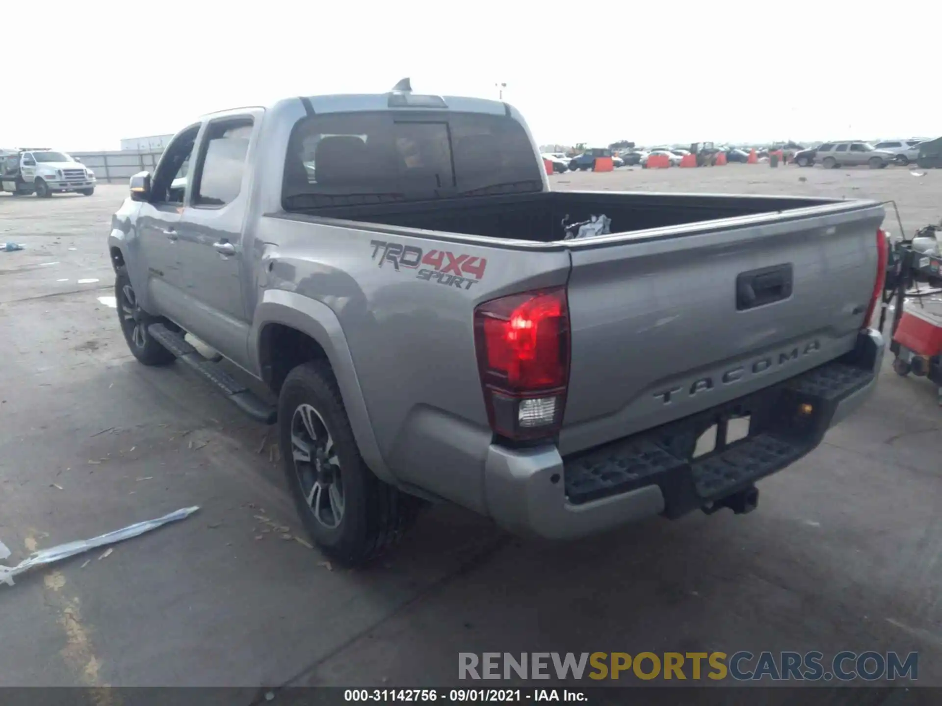 3 Photograph of a damaged car 3TMCZ5AN3KM287134 TOYOTA TACOMA 4WD 2019