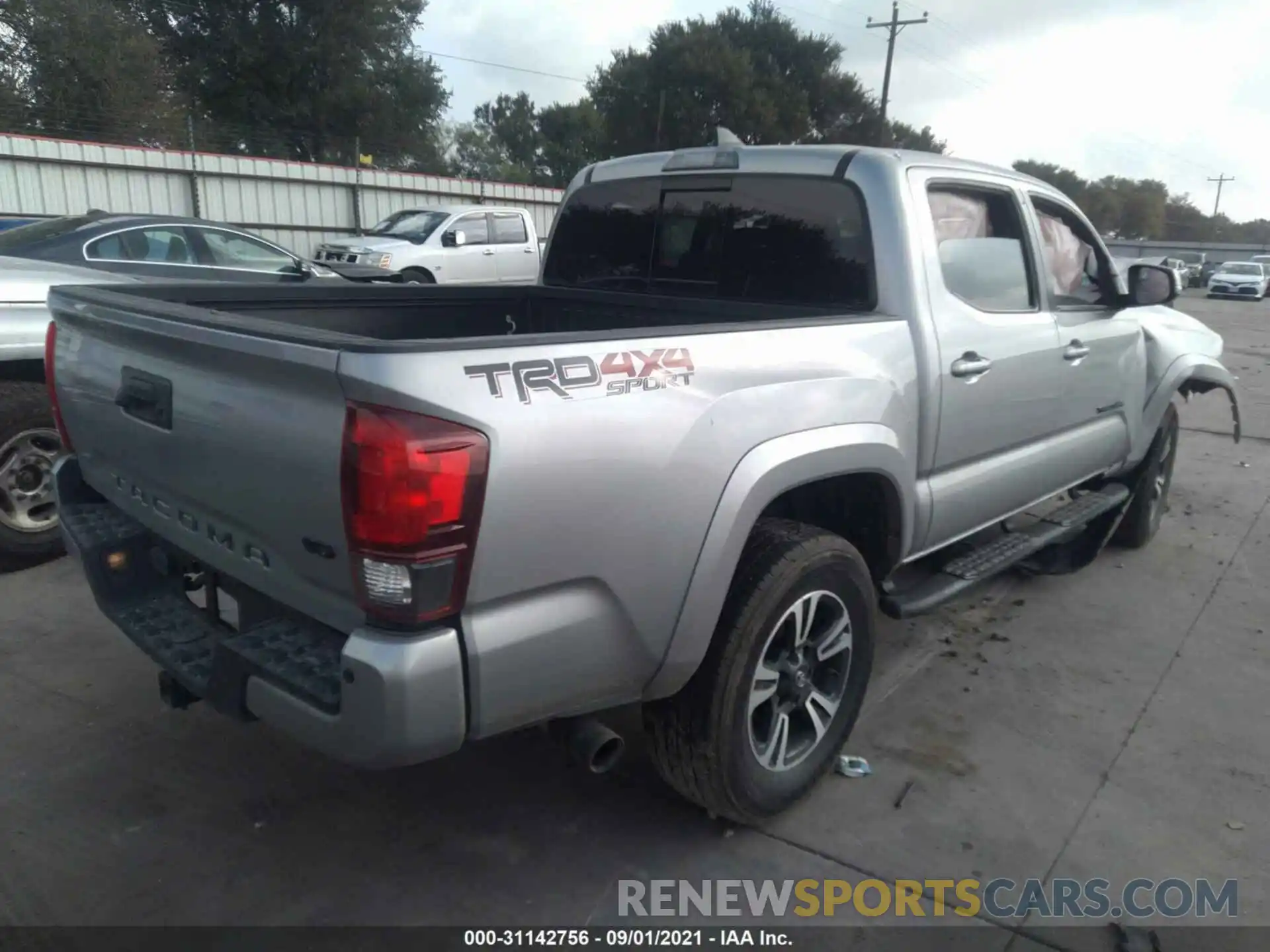 4 Photograph of a damaged car 3TMCZ5AN3KM287134 TOYOTA TACOMA 4WD 2019