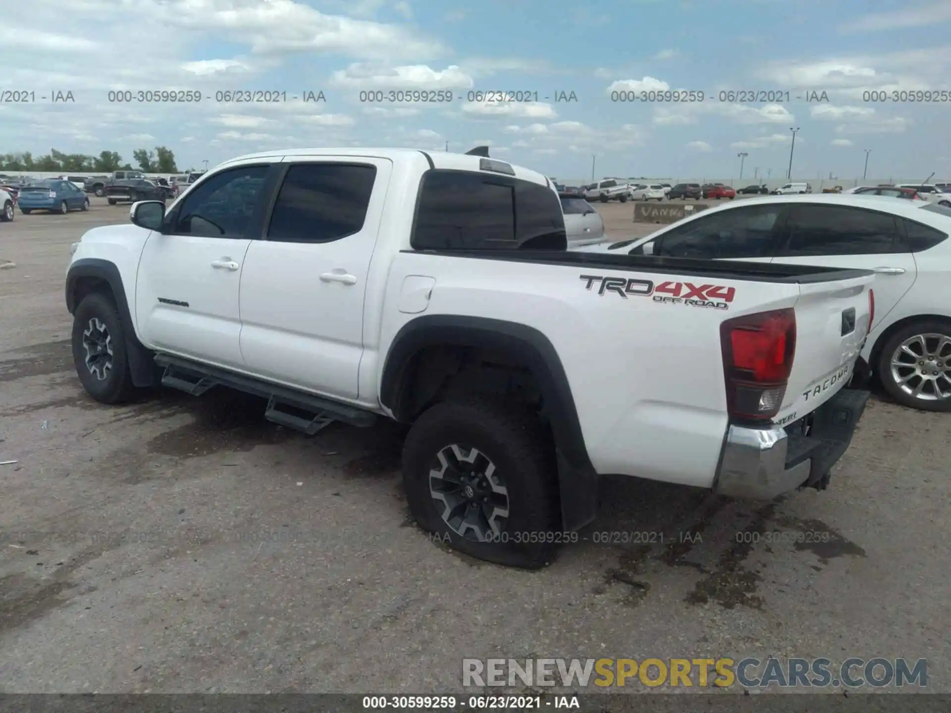 3 Photograph of a damaged car 3TMCZ5AN4KM191965 TOYOTA TACOMA 4WD 2019