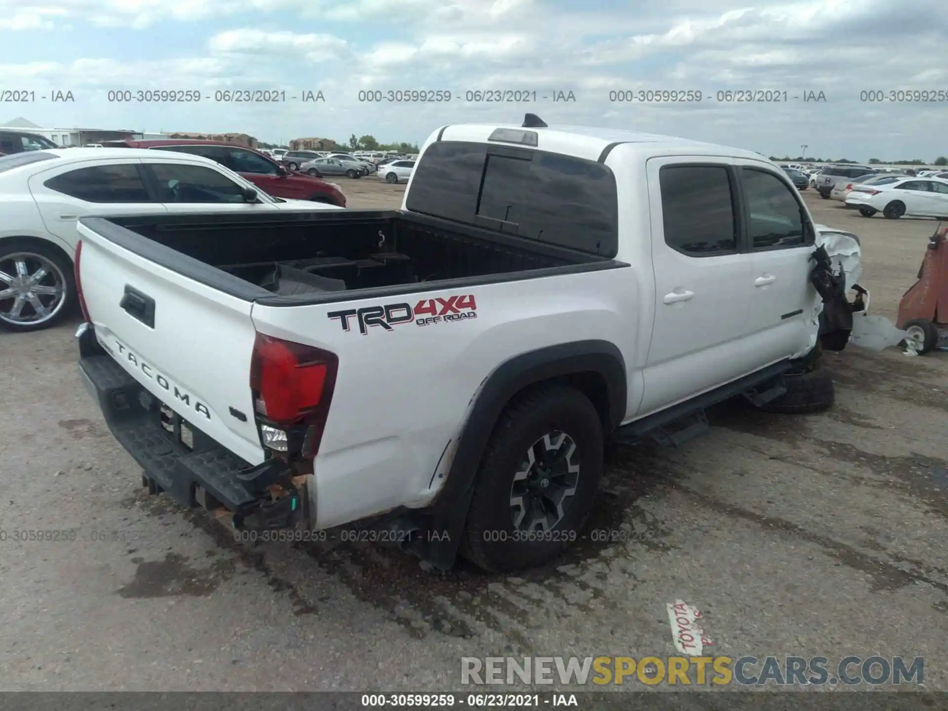 4 Photograph of a damaged car 3TMCZ5AN4KM191965 TOYOTA TACOMA 4WD 2019