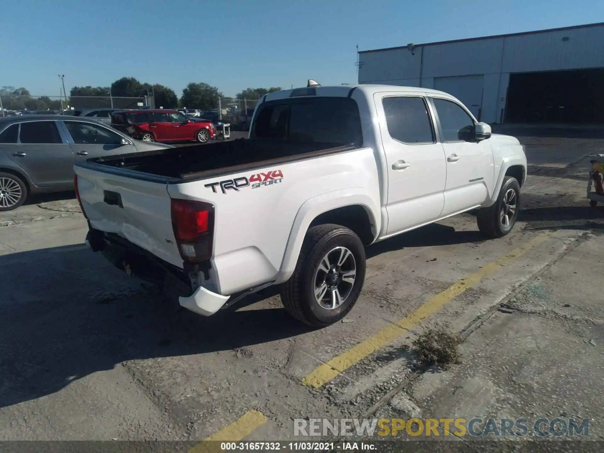 4 Photograph of a damaged car 3TMCZ5AN4KM192002 TOYOTA TACOMA 4WD 2019