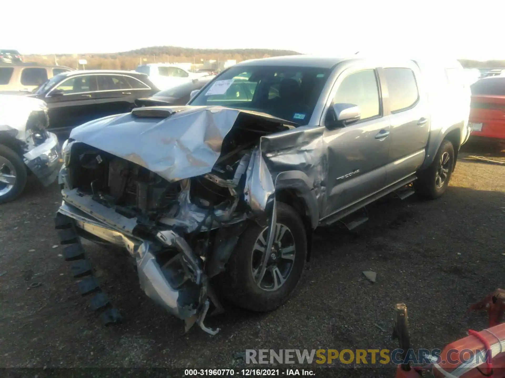 2 Photograph of a damaged car 3TMCZ5AN4KM214340 TOYOTA TACOMA 4WD 2019