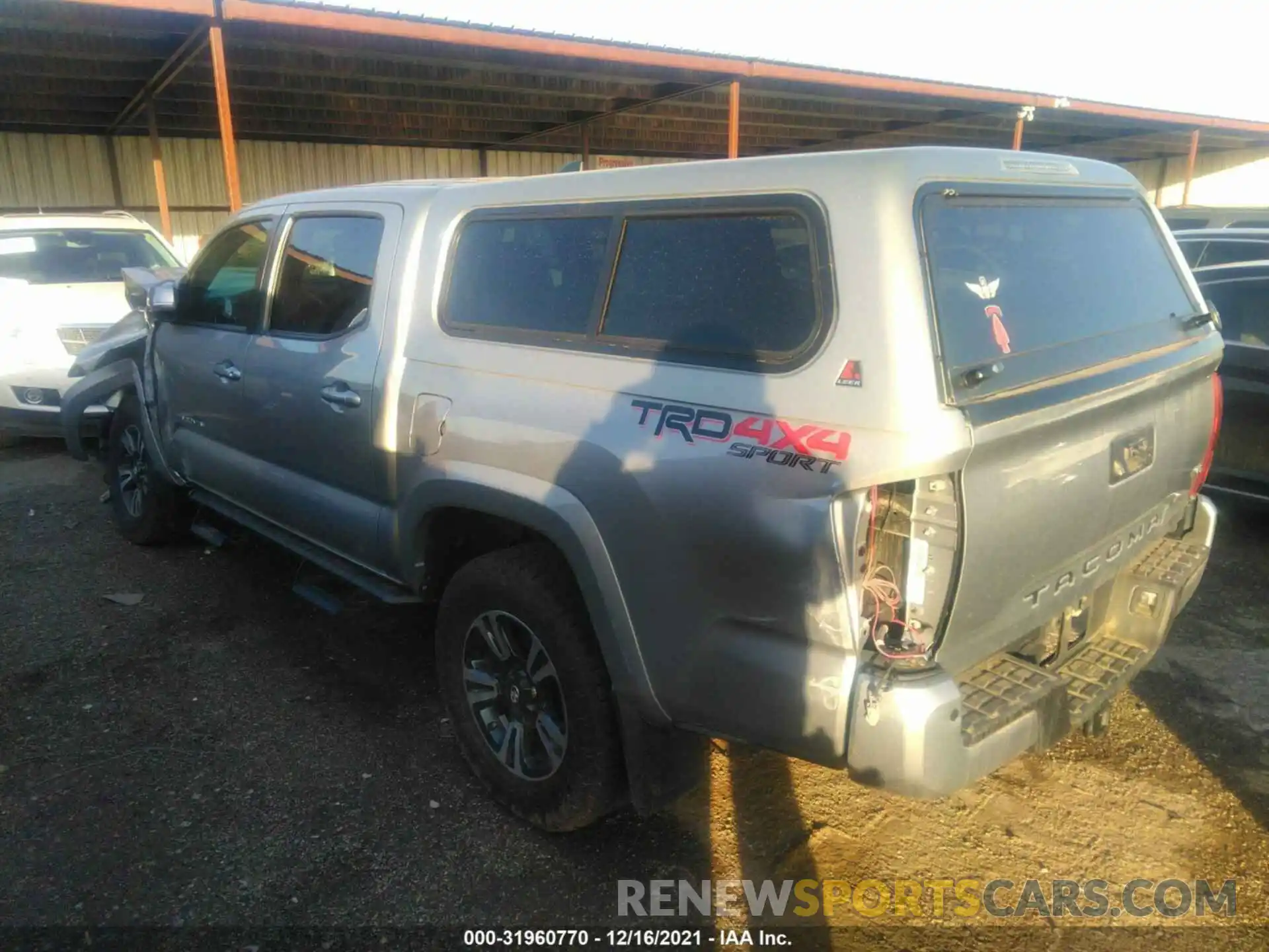 3 Photograph of a damaged car 3TMCZ5AN4KM214340 TOYOTA TACOMA 4WD 2019