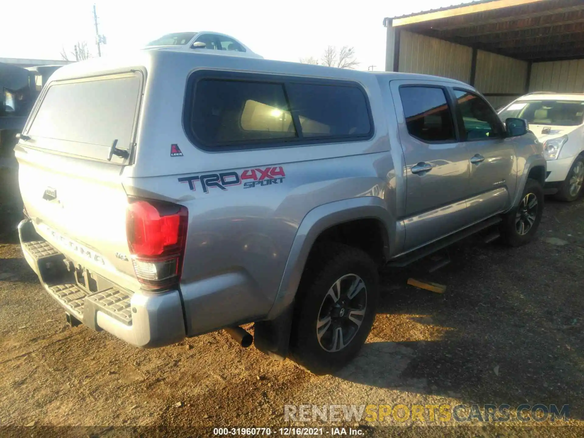 4 Photograph of a damaged car 3TMCZ5AN4KM214340 TOYOTA TACOMA 4WD 2019