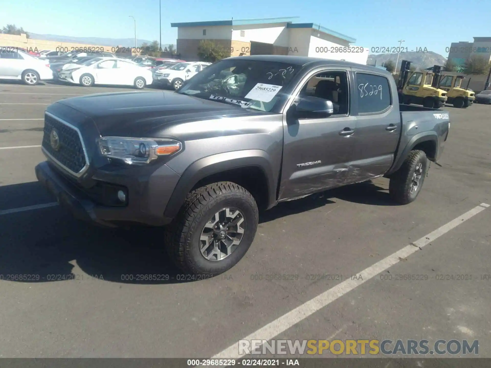 2 Photograph of a damaged car 3TMCZ5AN4KM222597 TOYOTA TACOMA 4WD 2019