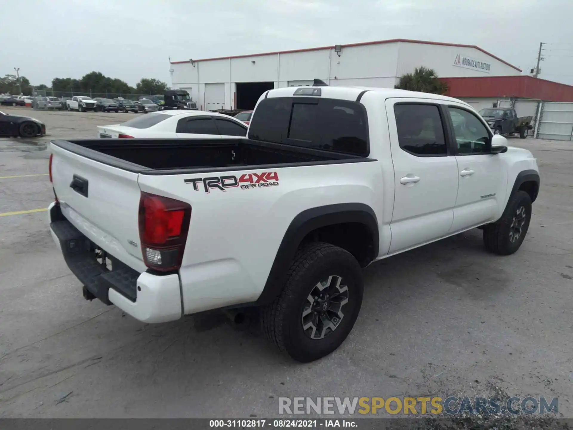 4 Photograph of a damaged car 3TMCZ5AN4KM227010 TOYOTA TACOMA 4WD 2019