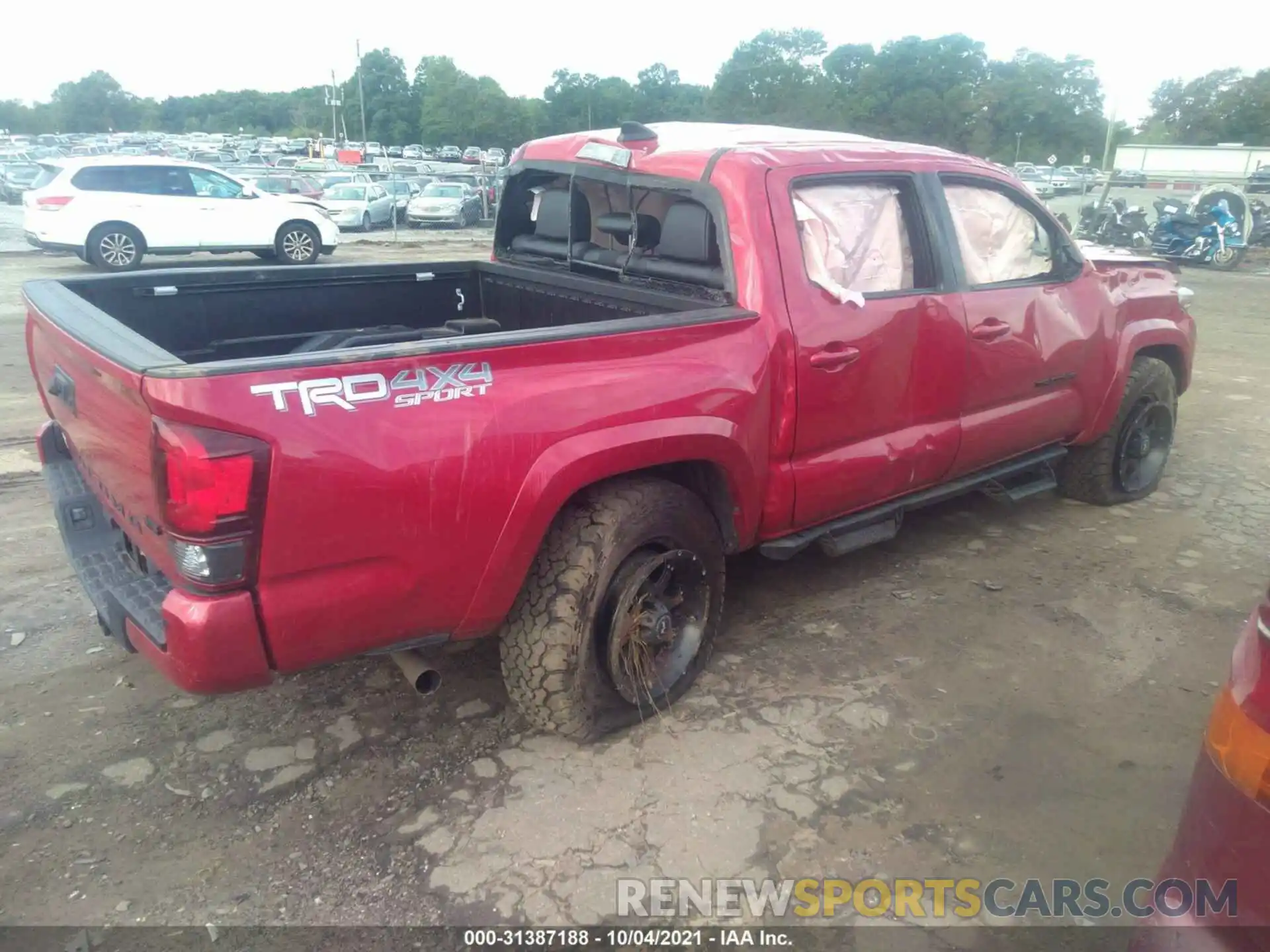 4 Photograph of a damaged car 3TMCZ5AN4KM246320 TOYOTA TACOMA 4WD 2019