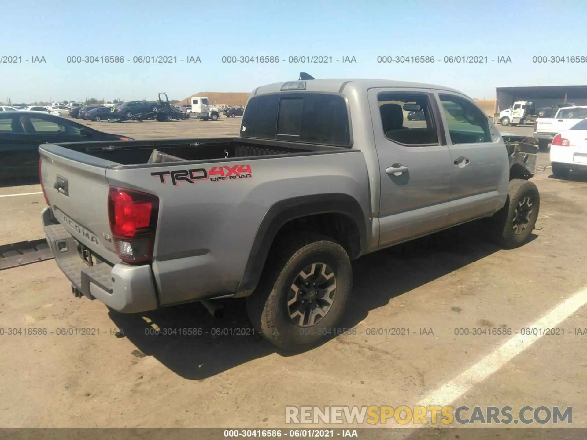 4 Photograph of a damaged car 3TMCZ5AN4KM252375 TOYOTA TACOMA 4WD 2019