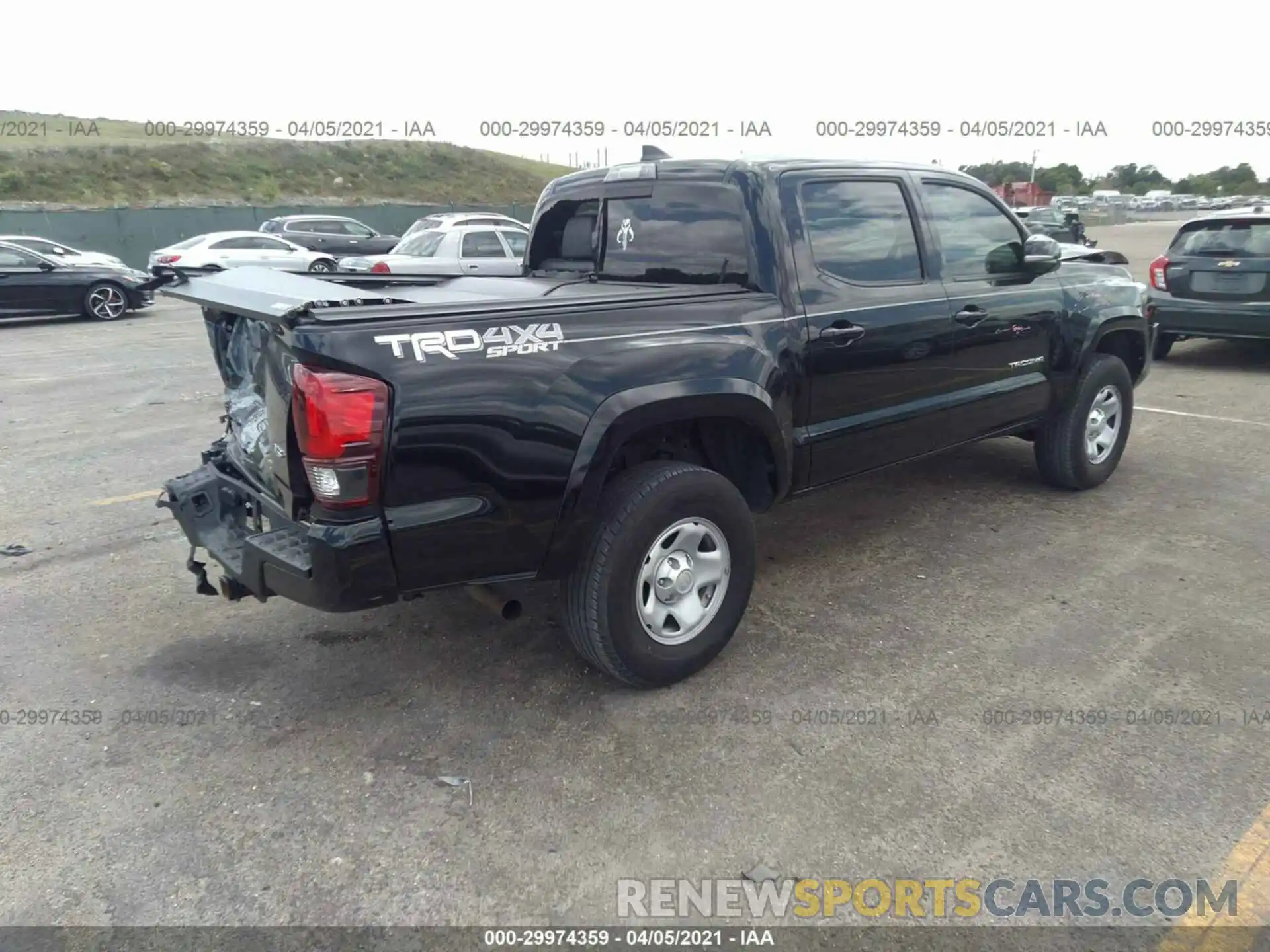 4 Photograph of a damaged car 3TMCZ5AN4KM258547 TOYOTA TACOMA 4WD 2019