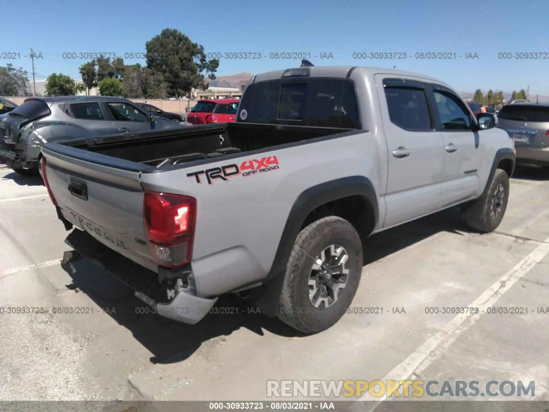 4 Photograph of a damaged car 3TMCZ5AN4KM268978 TOYOTA TACOMA 4WD 2019