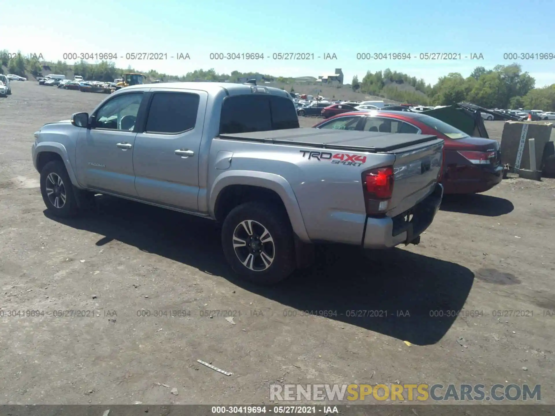 3 Photograph of a damaged car 3TMCZ5AN4KM277244 TOYOTA TACOMA 4WD 2019