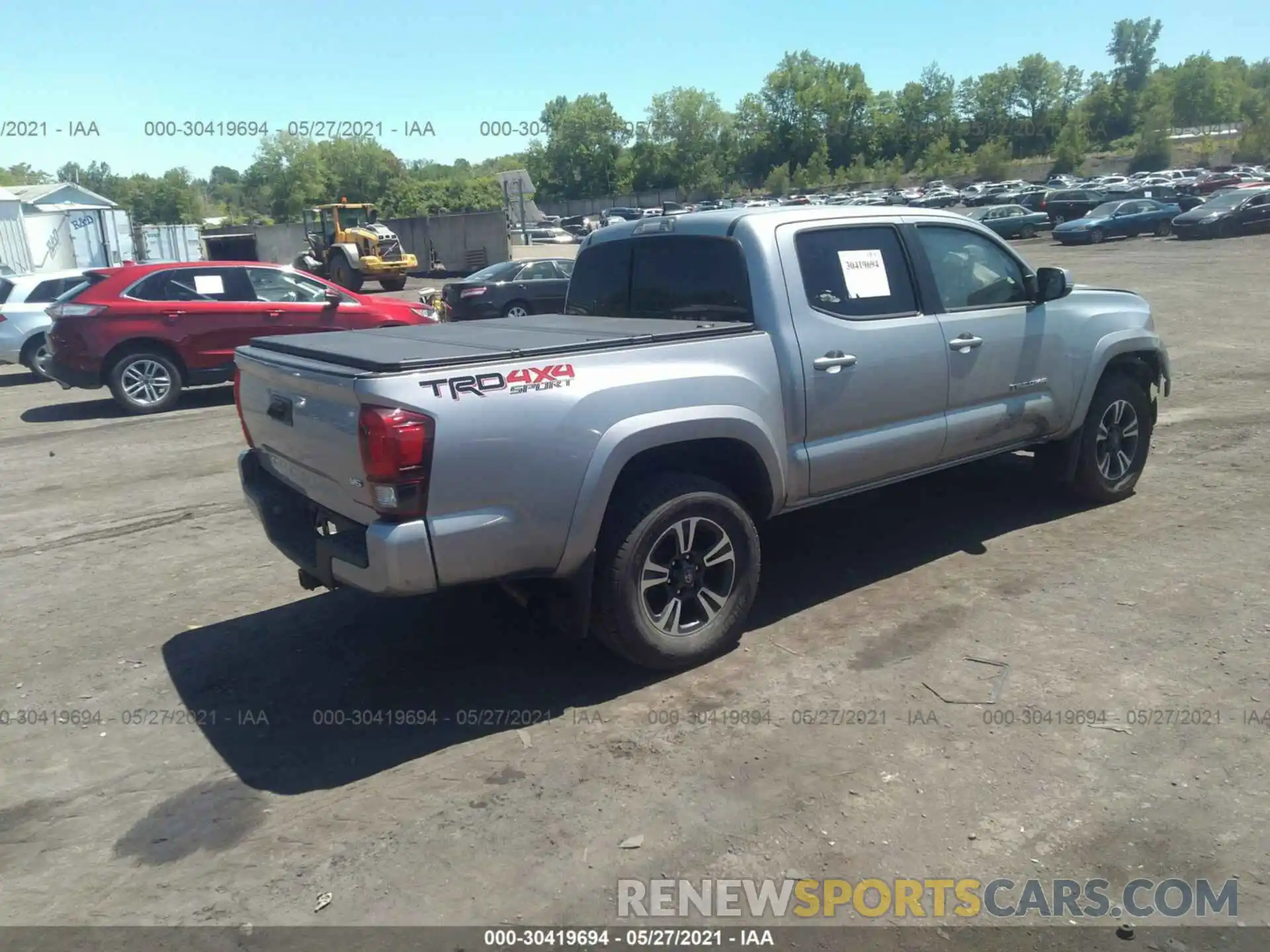 4 Photograph of a damaged car 3TMCZ5AN4KM277244 TOYOTA TACOMA 4WD 2019