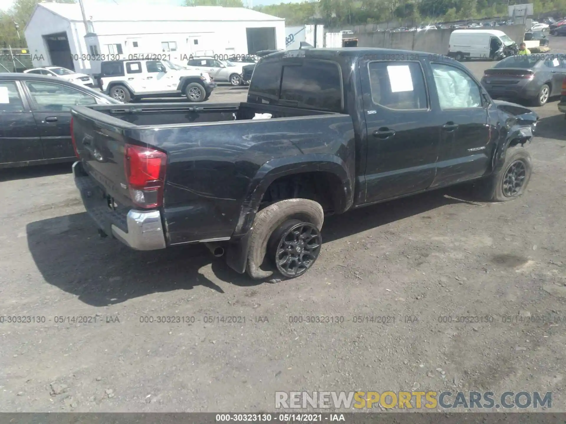 4 Photograph of a damaged car 3TMCZ5AN4KM279463 TOYOTA TACOMA 4WD 2019