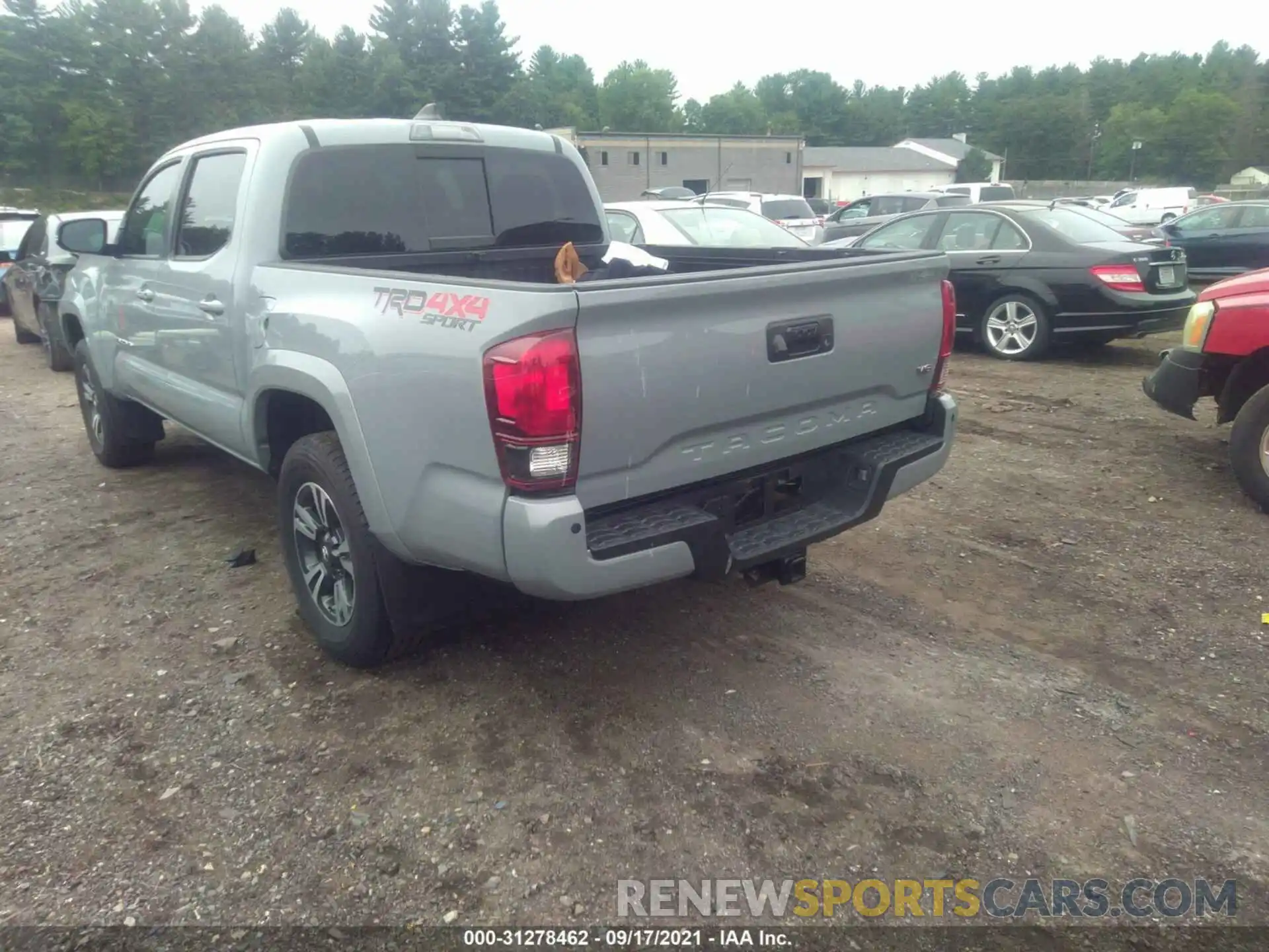 3 Photograph of a damaged car 3TMCZ5AN4KM281858 TOYOTA TACOMA 4WD 2019