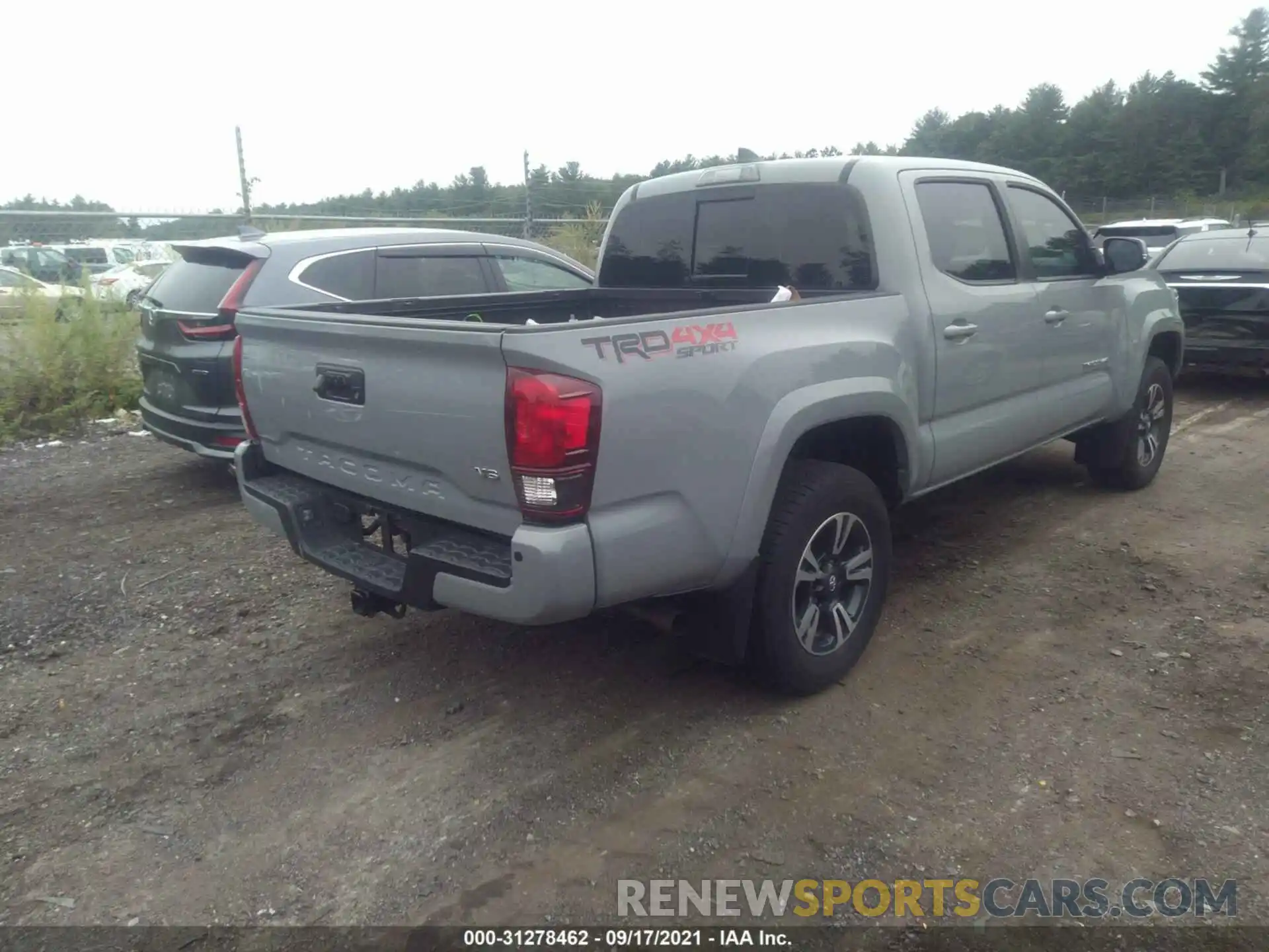 4 Photograph of a damaged car 3TMCZ5AN4KM281858 TOYOTA TACOMA 4WD 2019