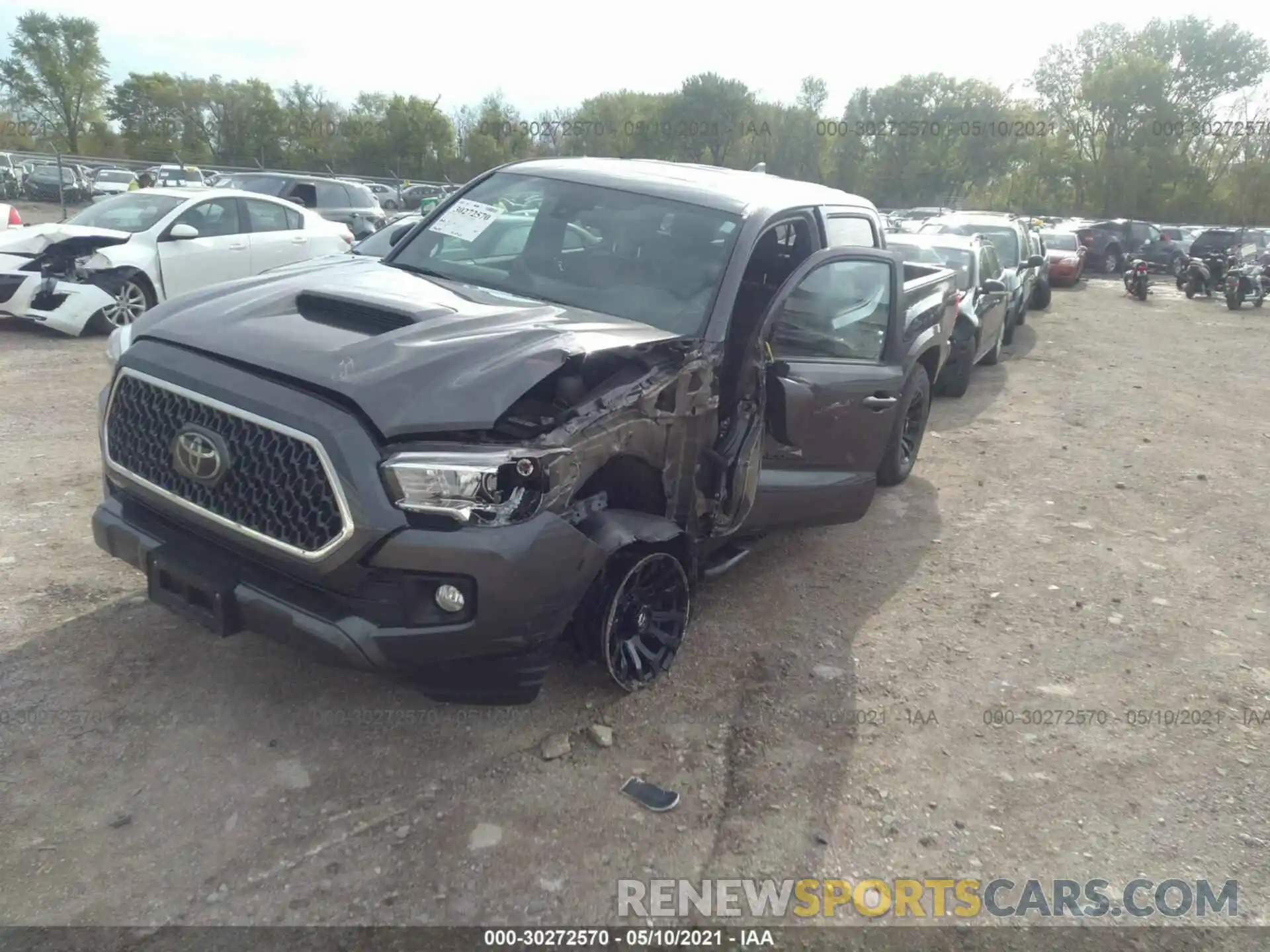 2 Photograph of a damaged car 3TMCZ5AN4KM288048 TOYOTA TACOMA 4WD 2019