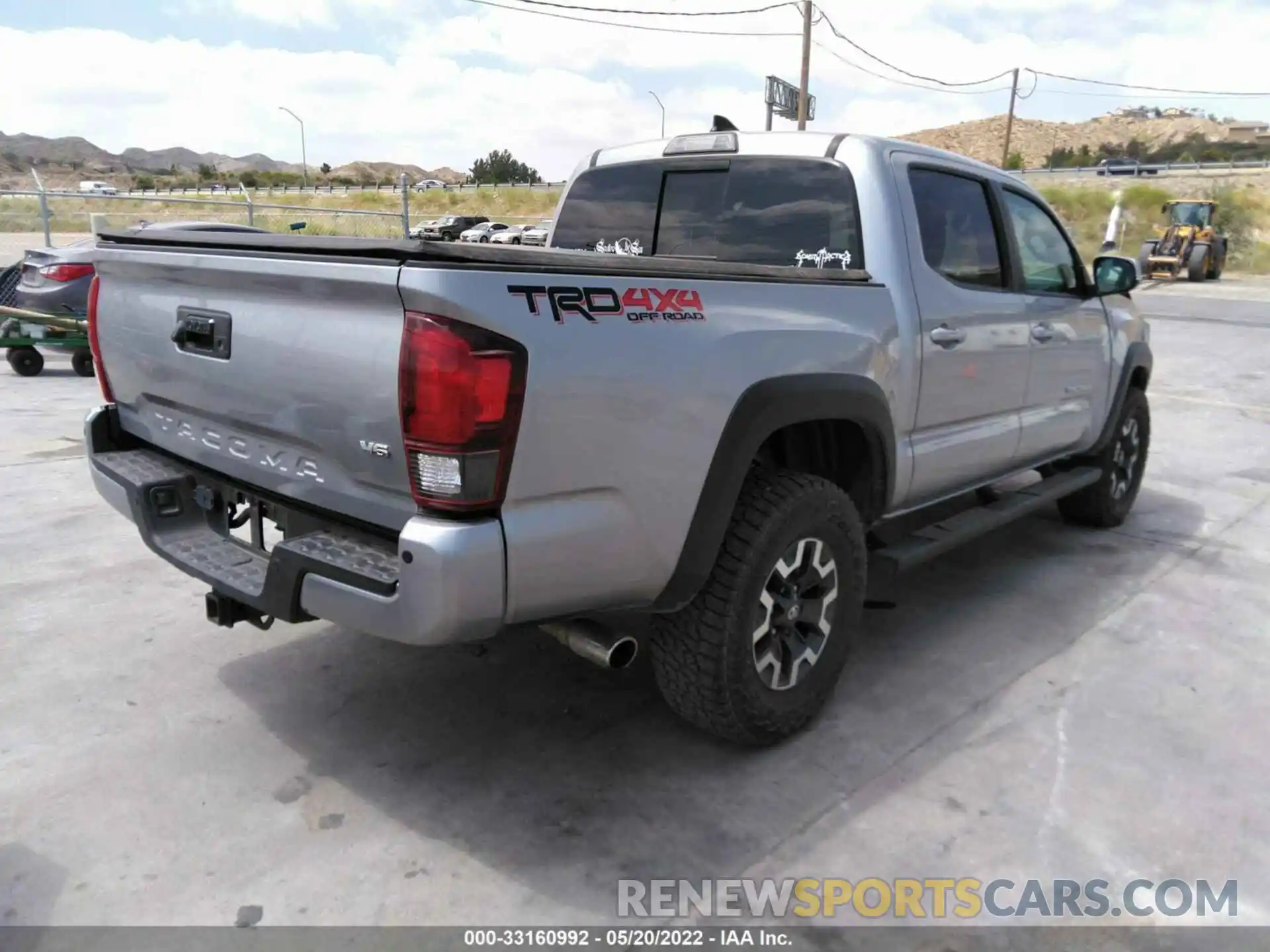 4 Photograph of a damaged car 3TMCZ5AN5KM193241 TOYOTA TACOMA 4WD 2019