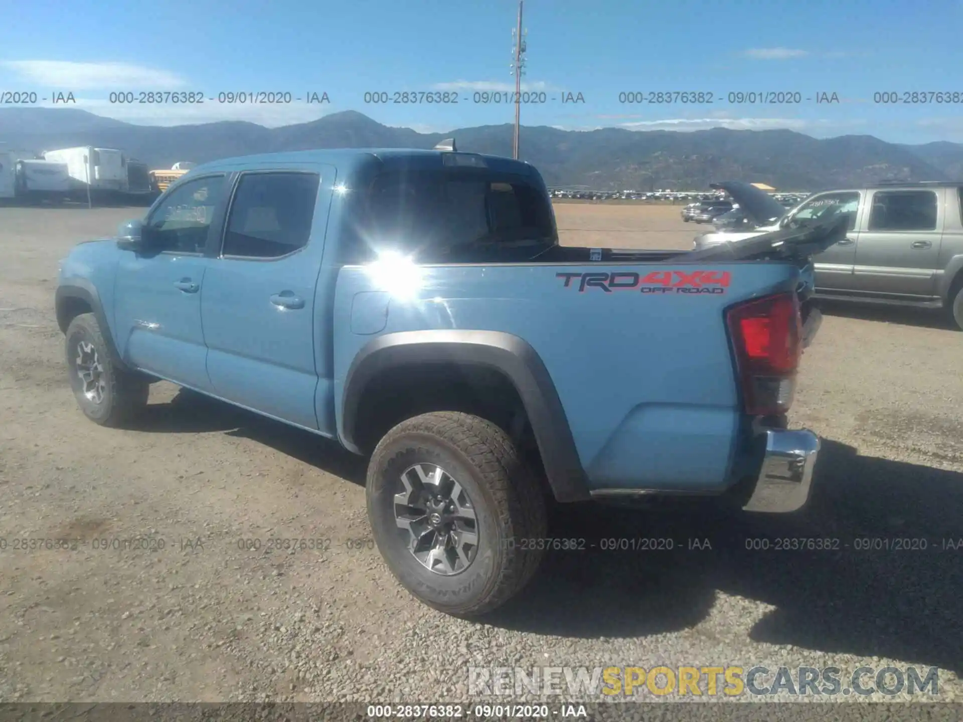 3 Photograph of a damaged car 3TMCZ5AN5KM194163 TOYOTA TACOMA 4WD 2019