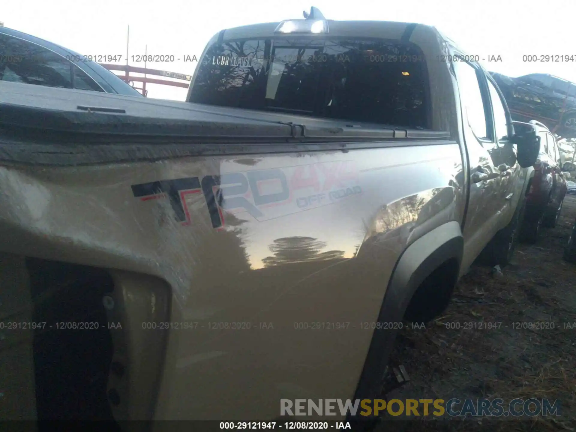 4 Photograph of a damaged car 3TMCZ5AN5KM199198 TOYOTA TACOMA 4WD 2019