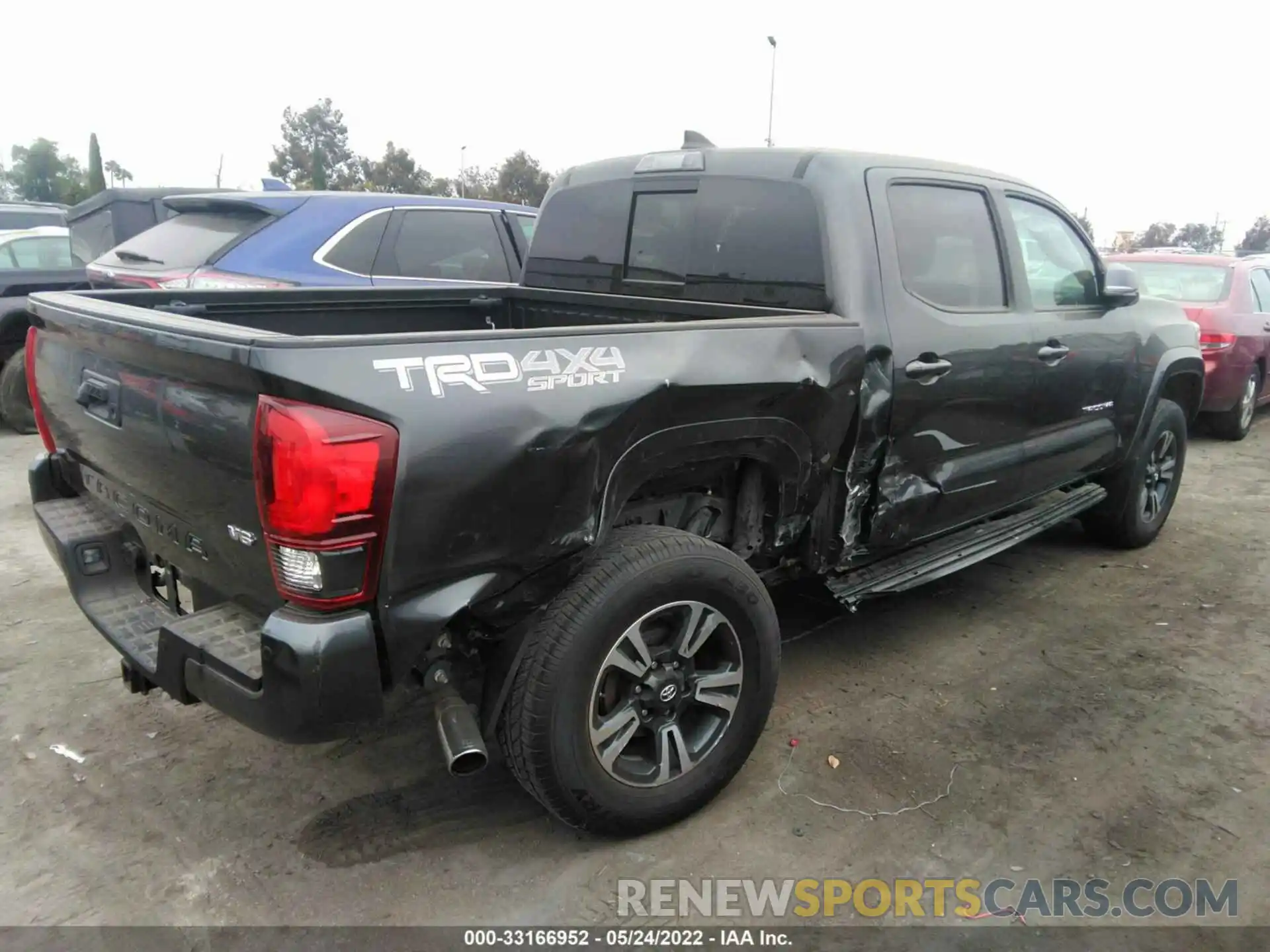 4 Photograph of a damaged car 3TMCZ5AN5KM206246 TOYOTA TACOMA 4WD 2019